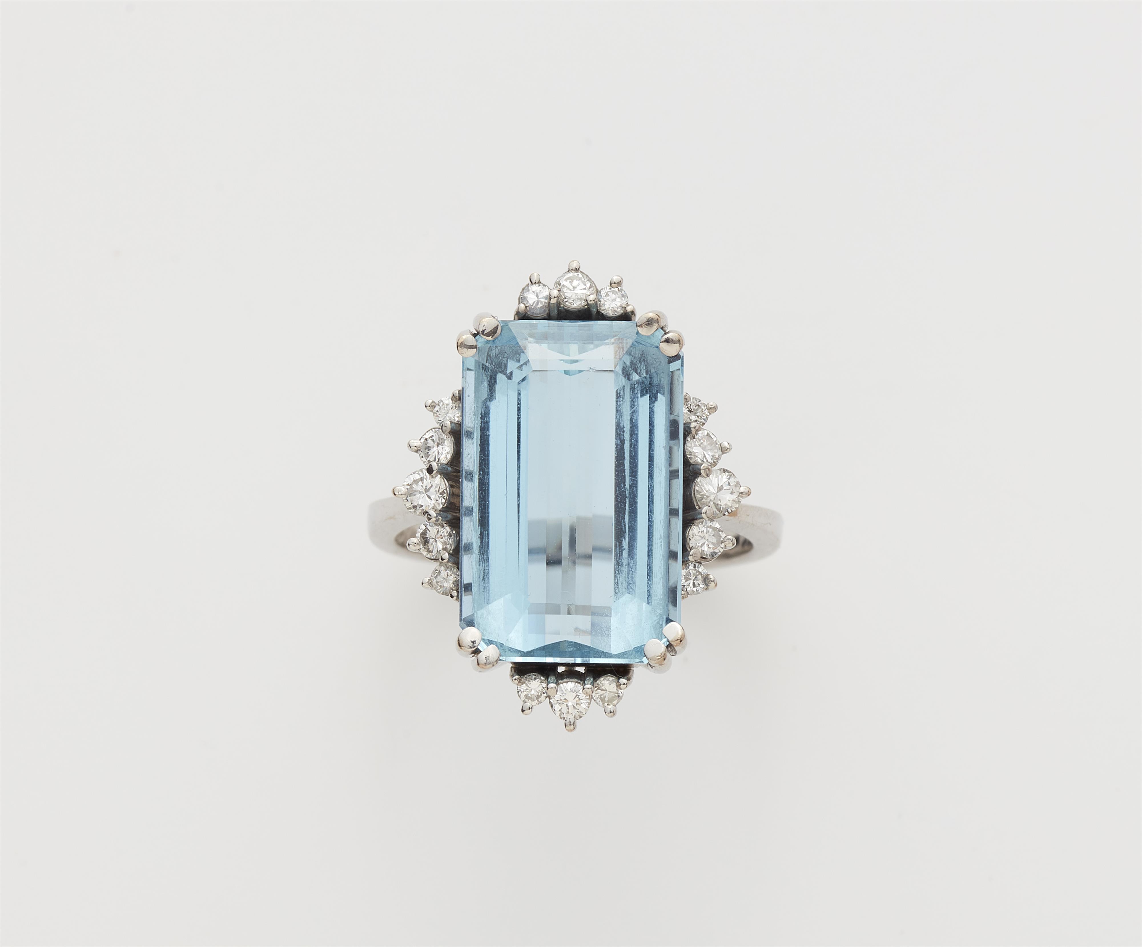 An 18k white gold aquamarine and diamond ring. - image-1