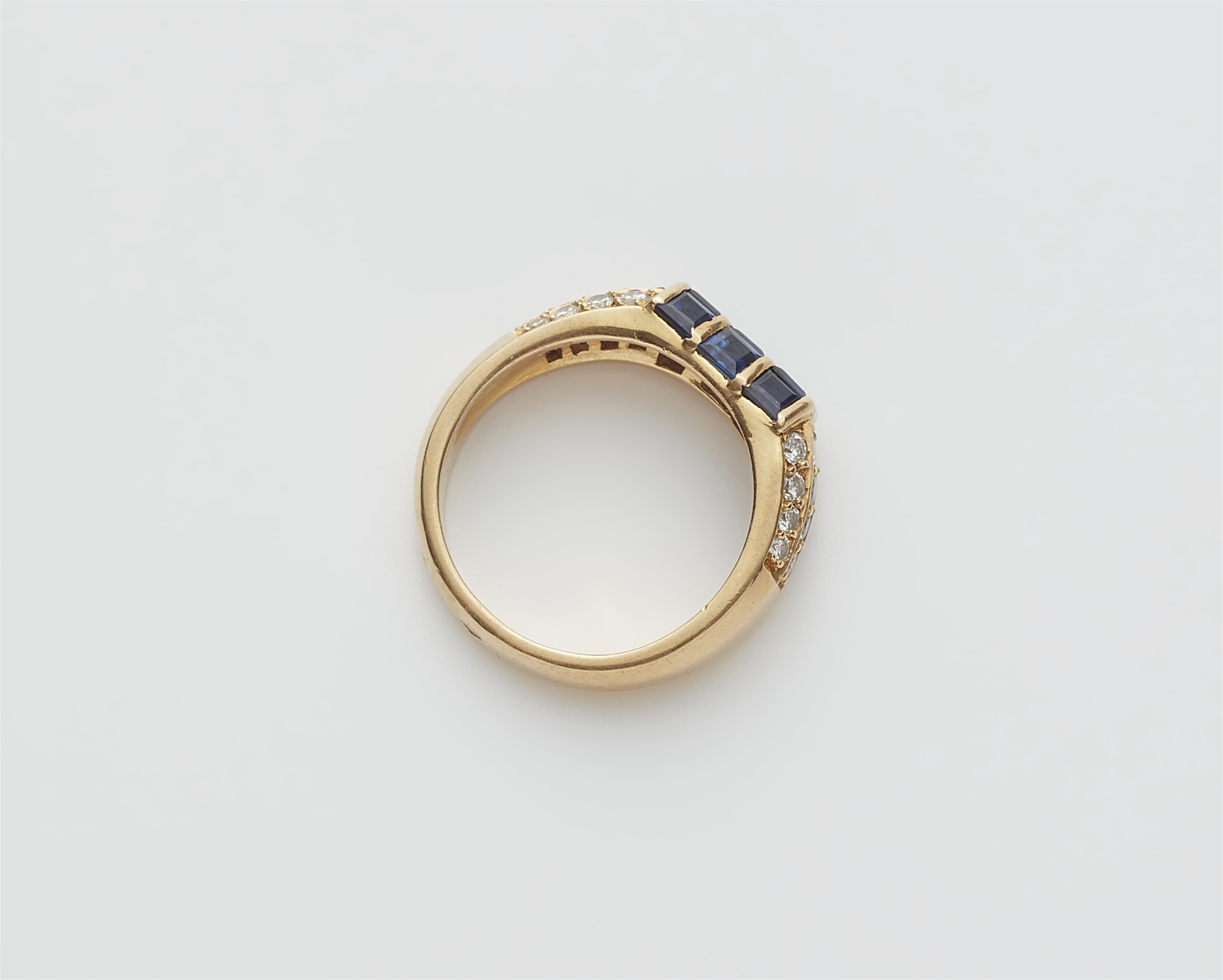 A French 18k gold diamond and sapphire eternity ring. - image-2