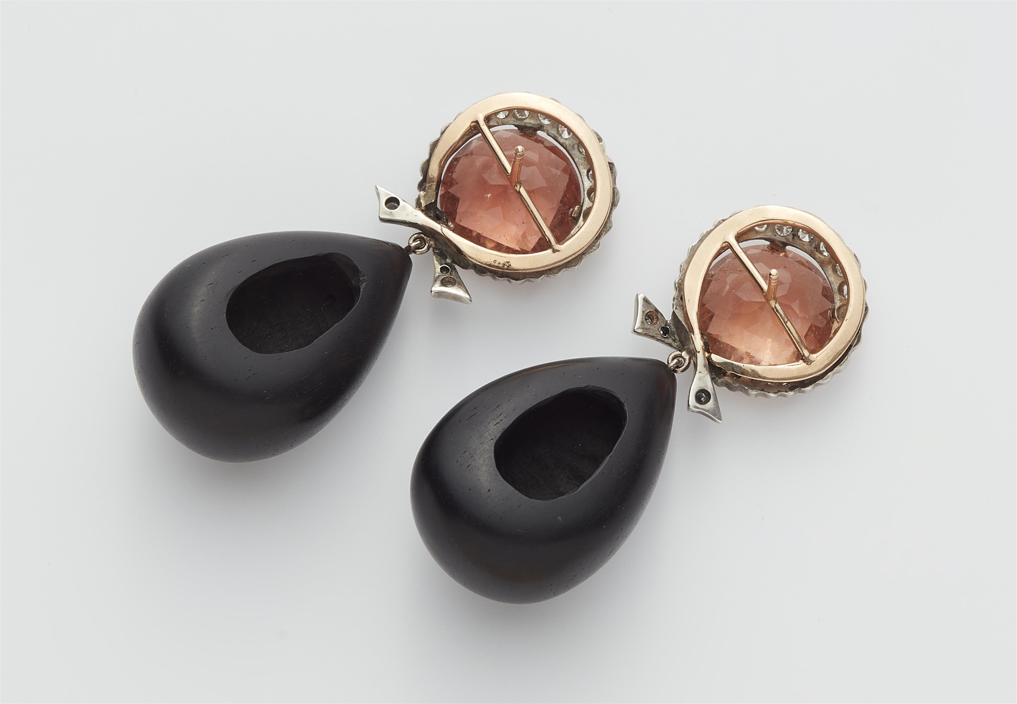 A pair of 14k gold pink tourmaline and polished wood pampil earrings. - image-2