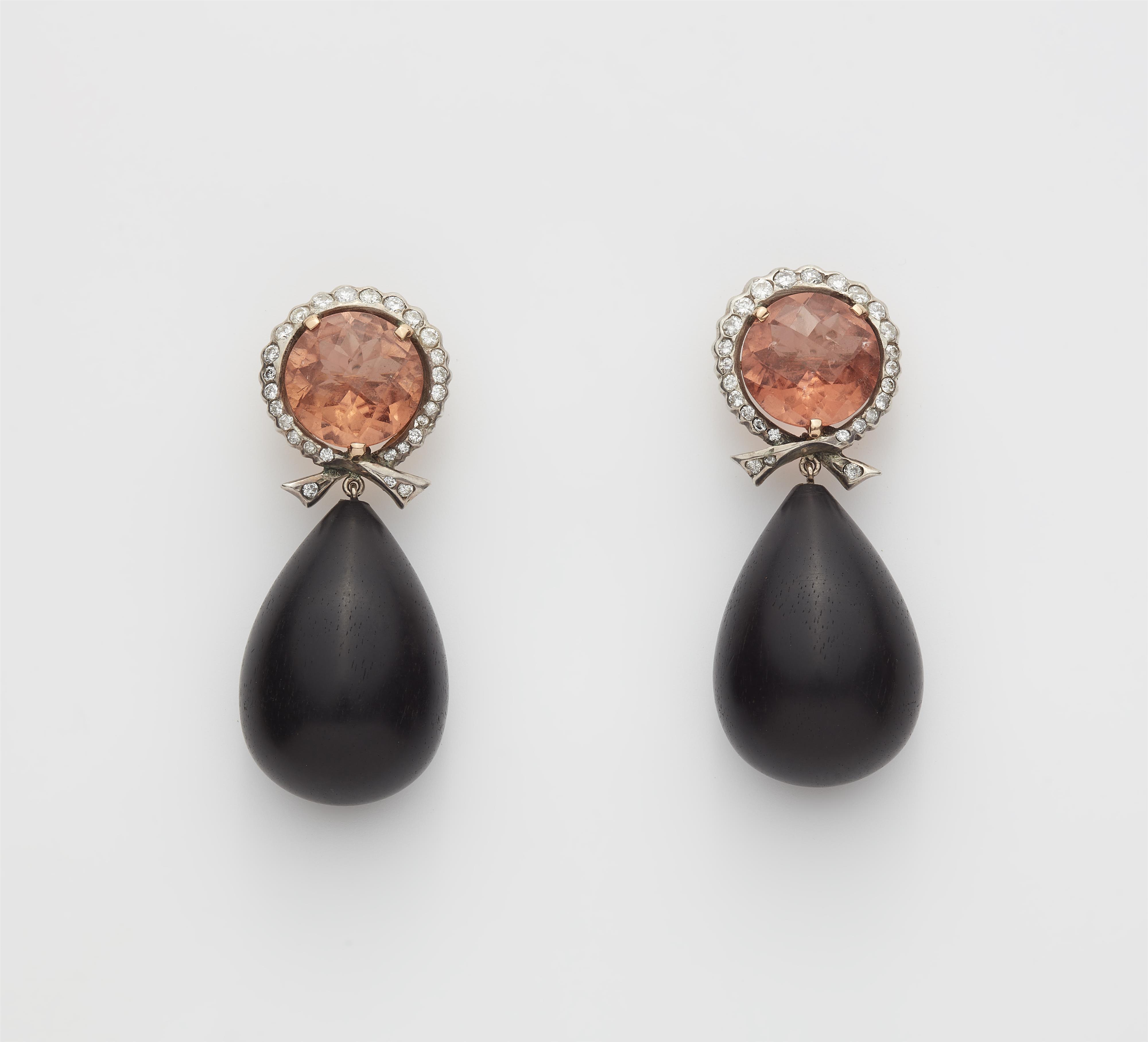 A pair of 14k gold pink tourmaline and polished wood pampil earrings. - image-1