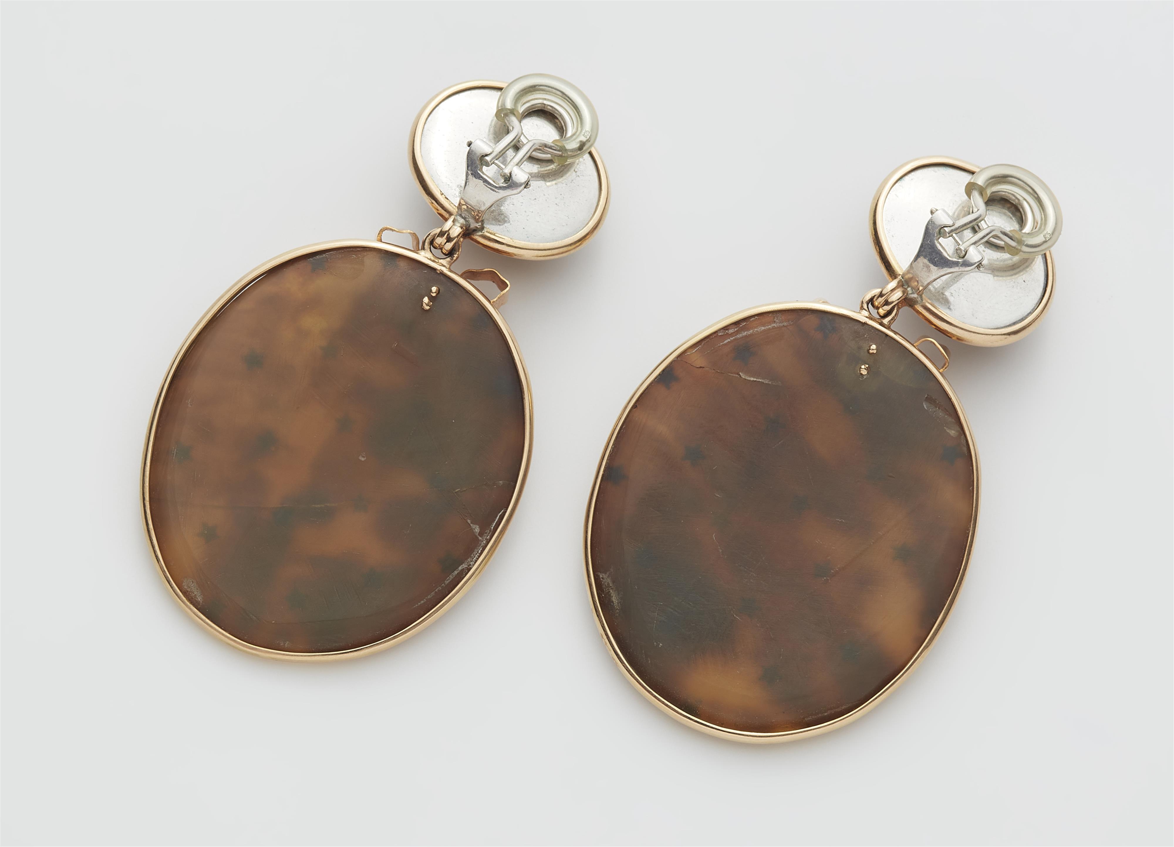 A pair of custom made 14k gold silver and smoky quartz bow earrings using parts of a 19th century tortoiseshell spectacle case with gold piqué point. - image-2