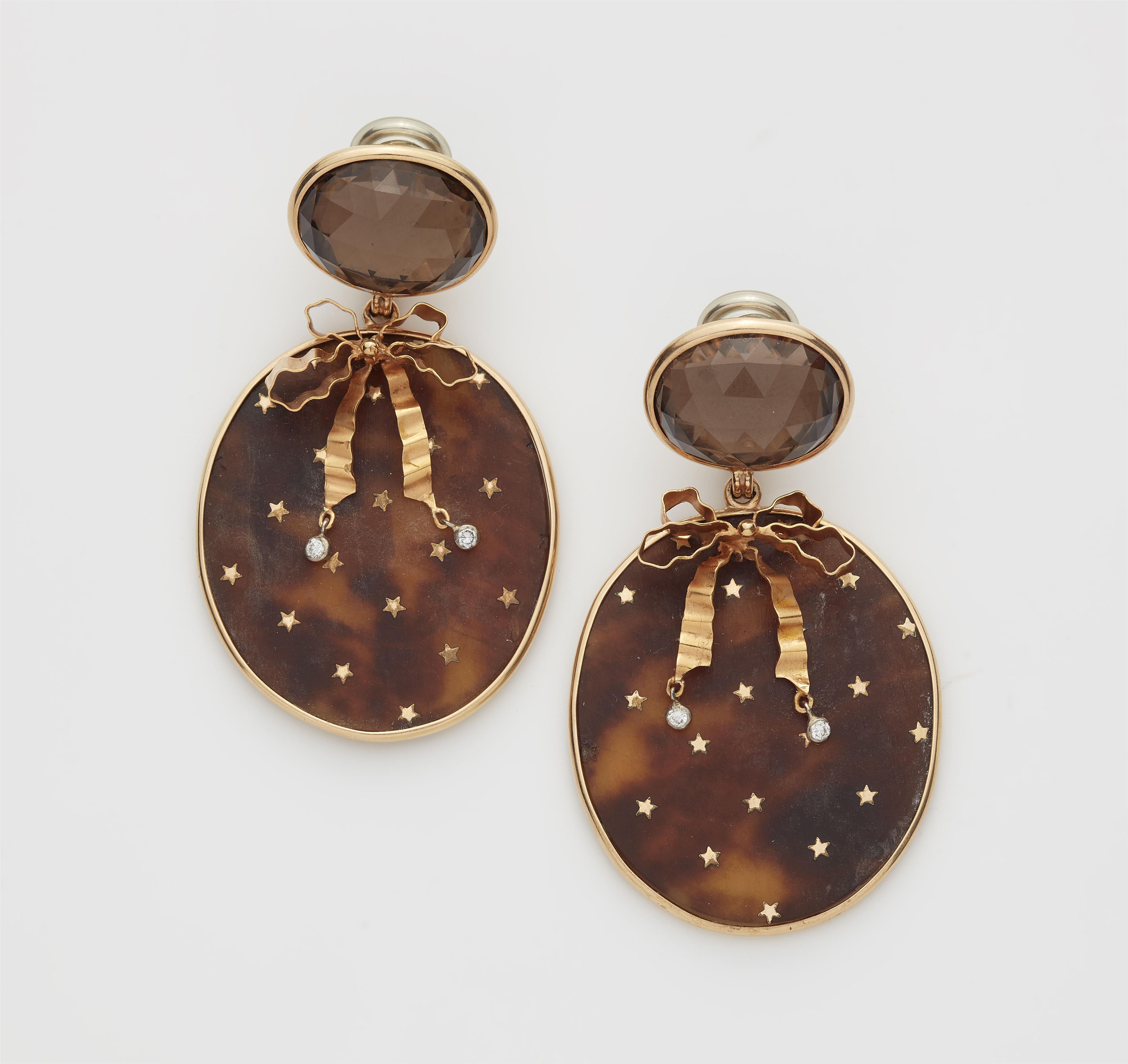 A pair of custom made 14k gold silver and smoky quartz bow earrings using parts of a 19th century tortoiseshell spectacle case with gold piqué point. - image-1