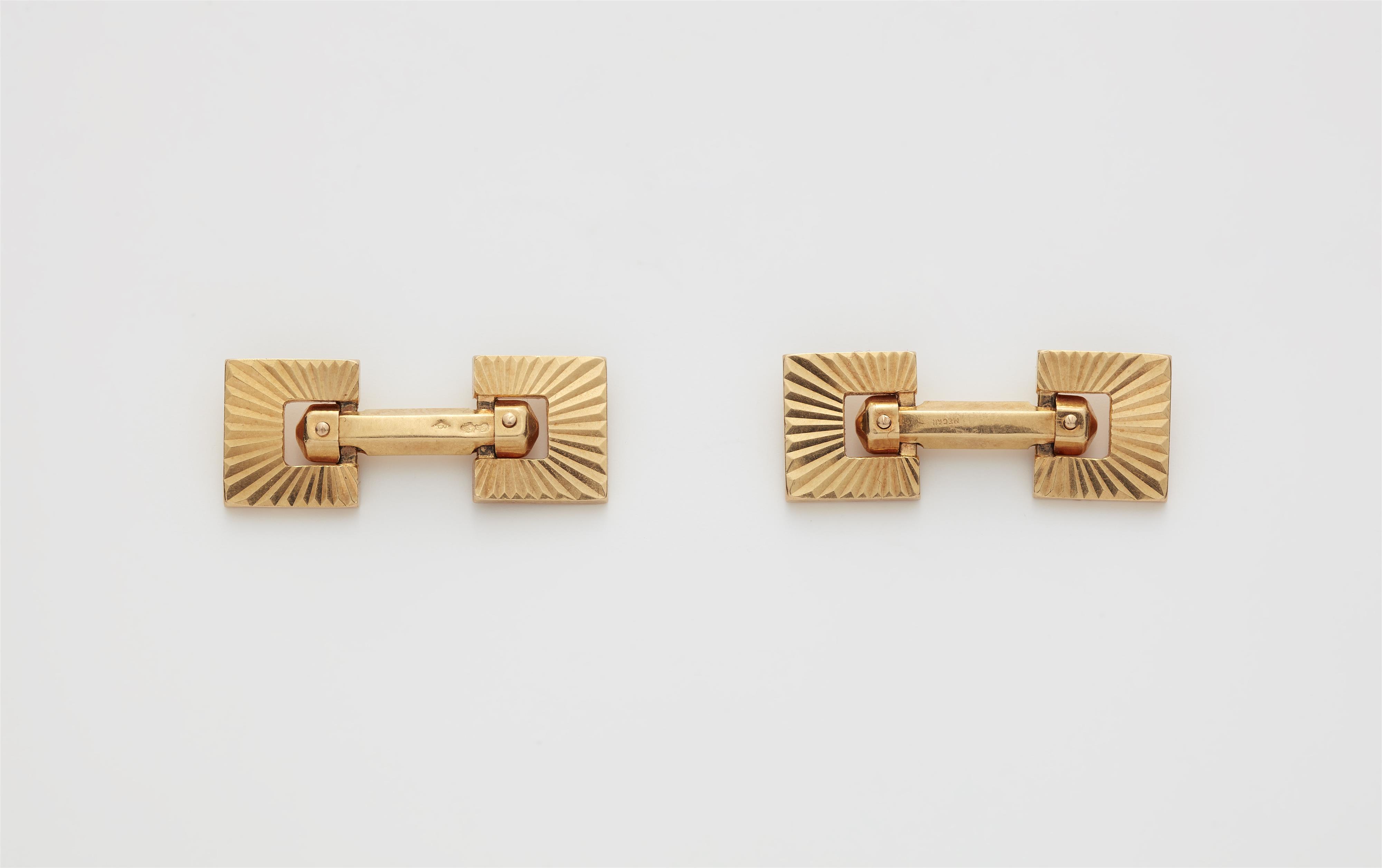 A pair of French 18k gold stirrup cufflinks. - image-1