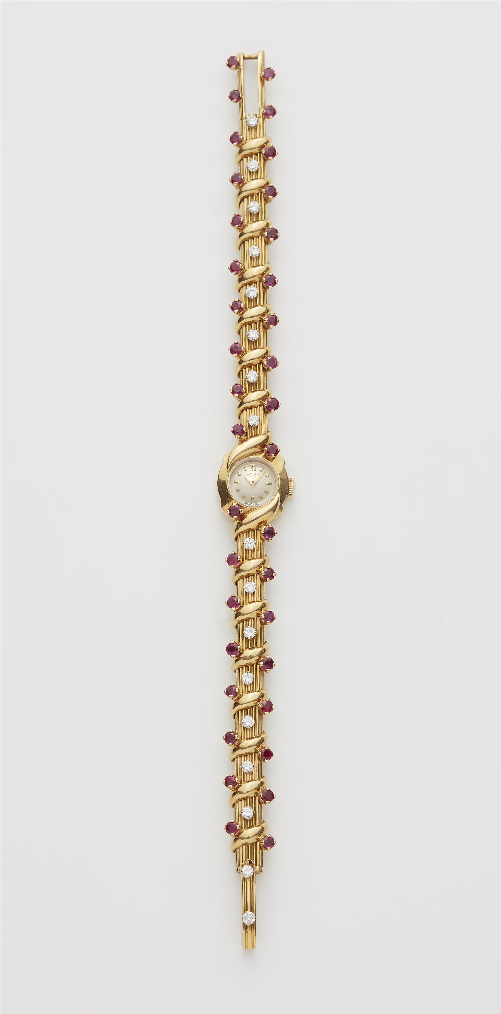 An 18k yellow gold manually wound ruby and diamond ladies Omega wristwatch. - image-1