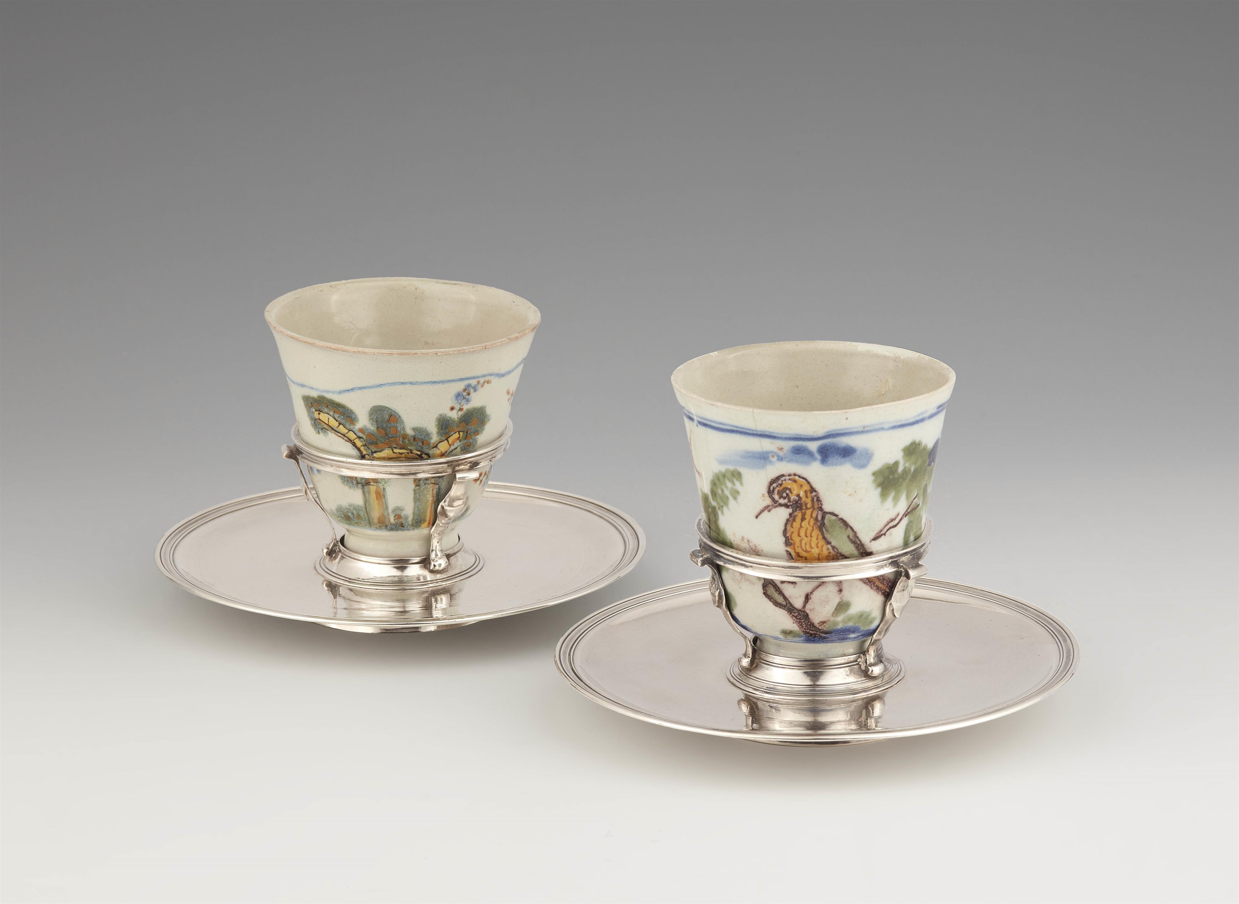 A pair of Genoan silver-mounted majolica trembleuse cups - image-1