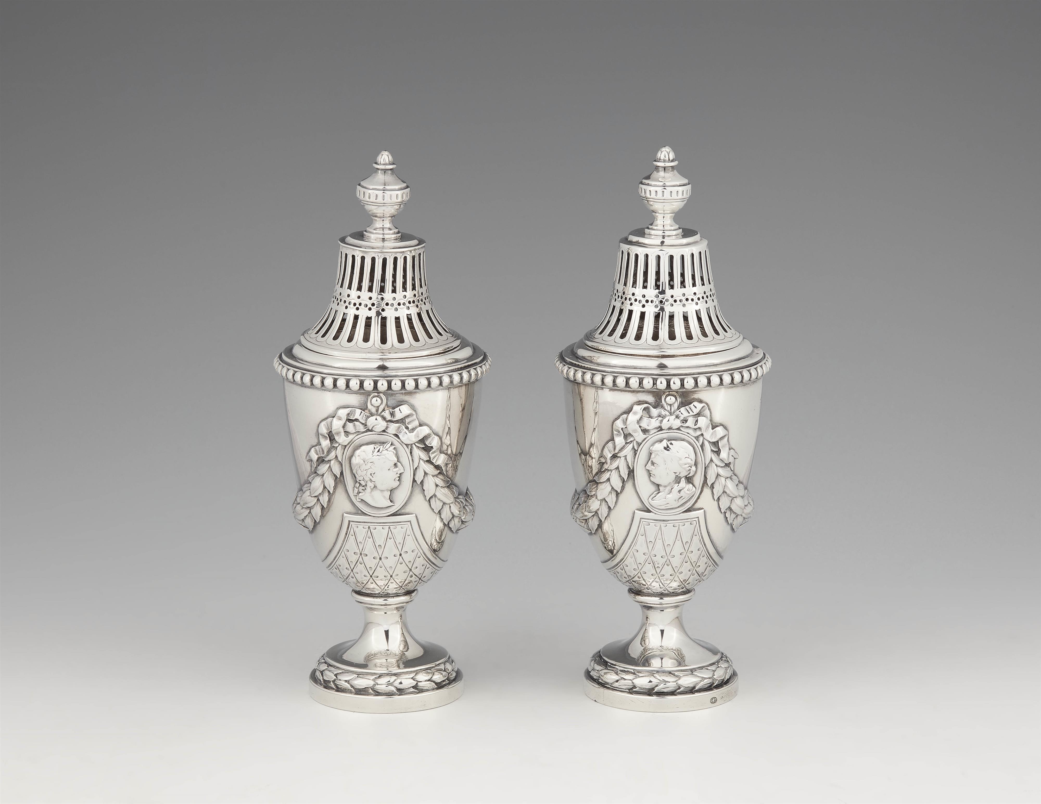 A pair of Amsterdam silver sugar casters - image-1