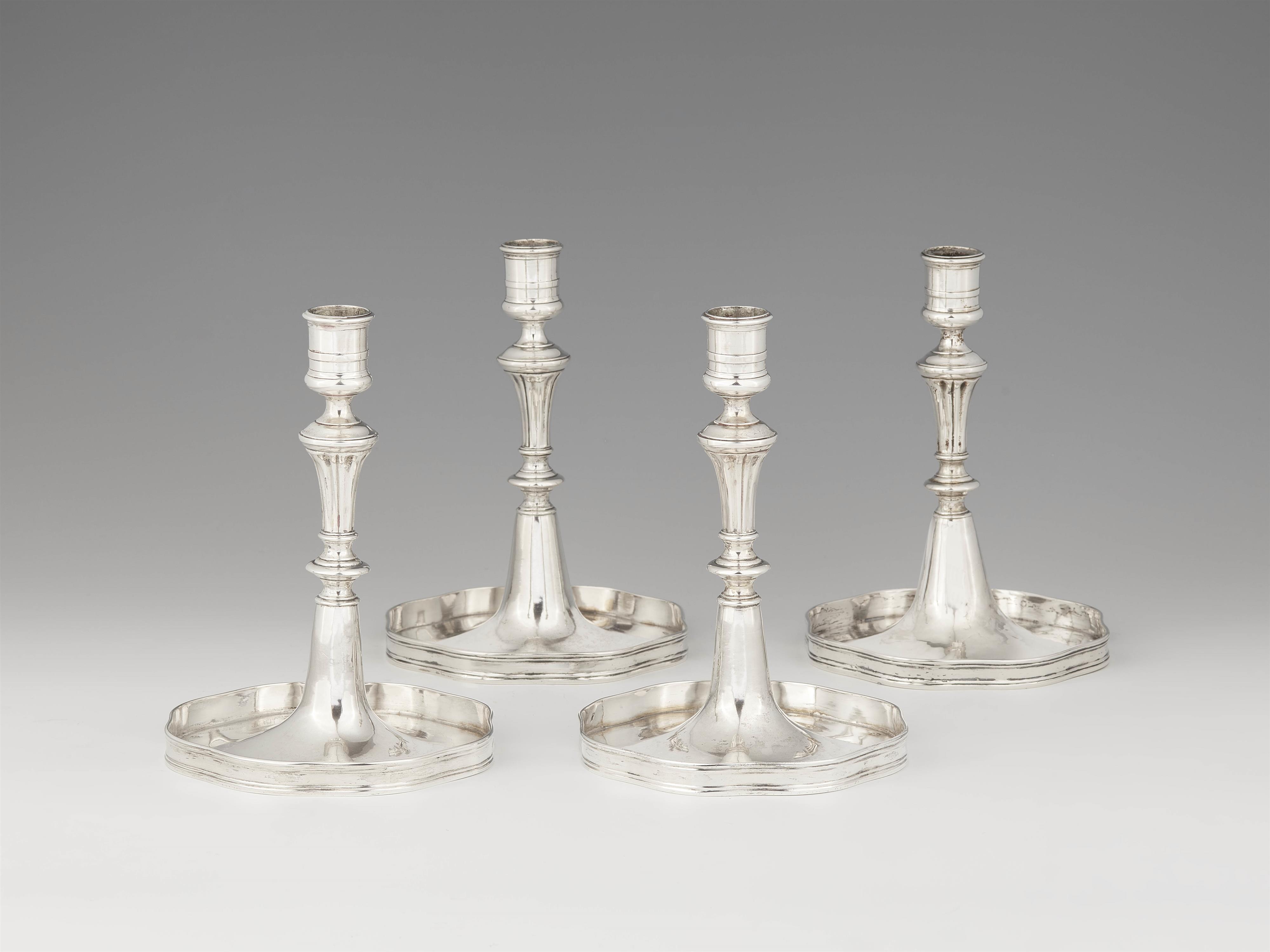 A set of four Vienna silver card players' candlesticks - image-1