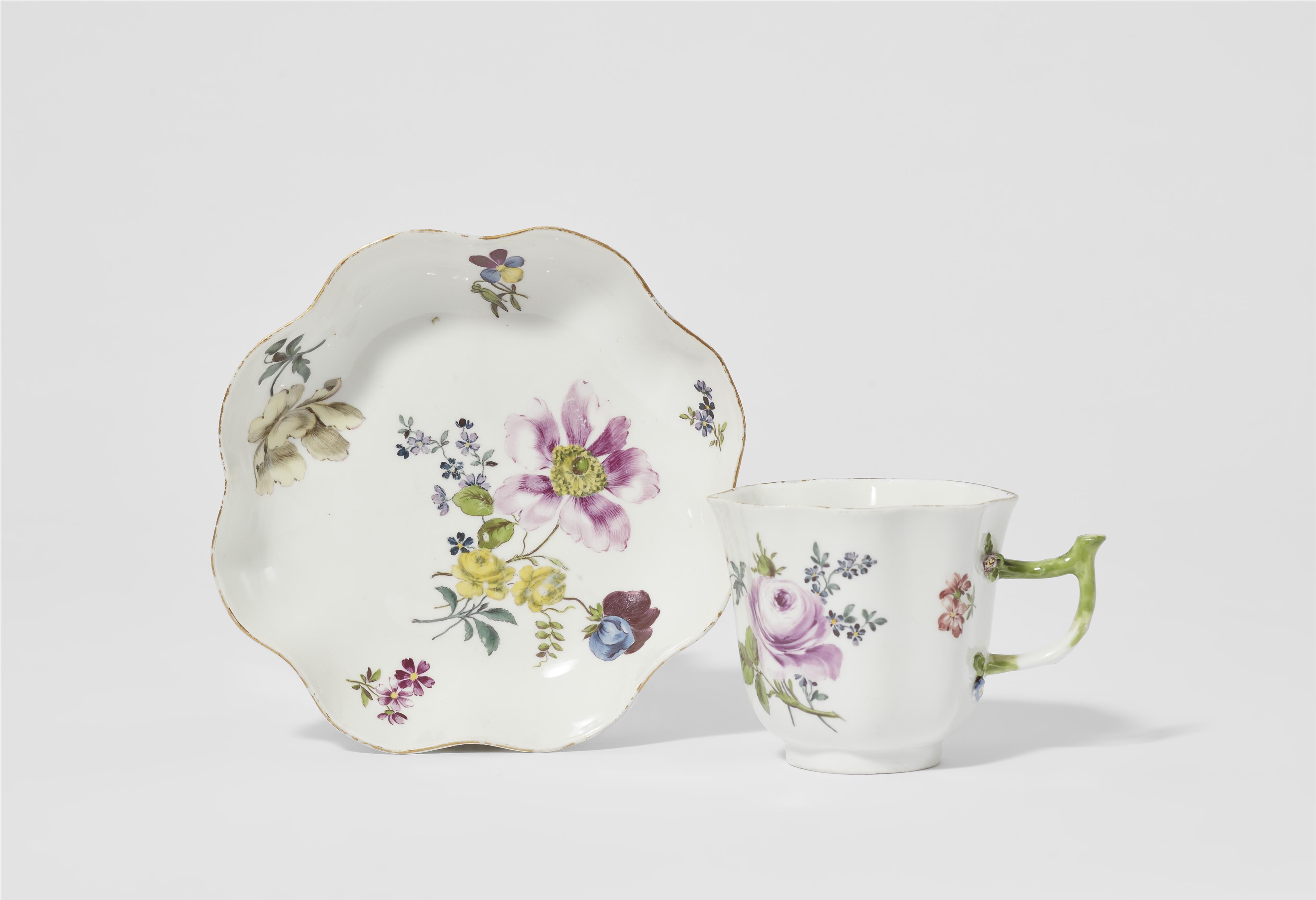 A Meissen porcelain cup and saucer with floral decor - image-1