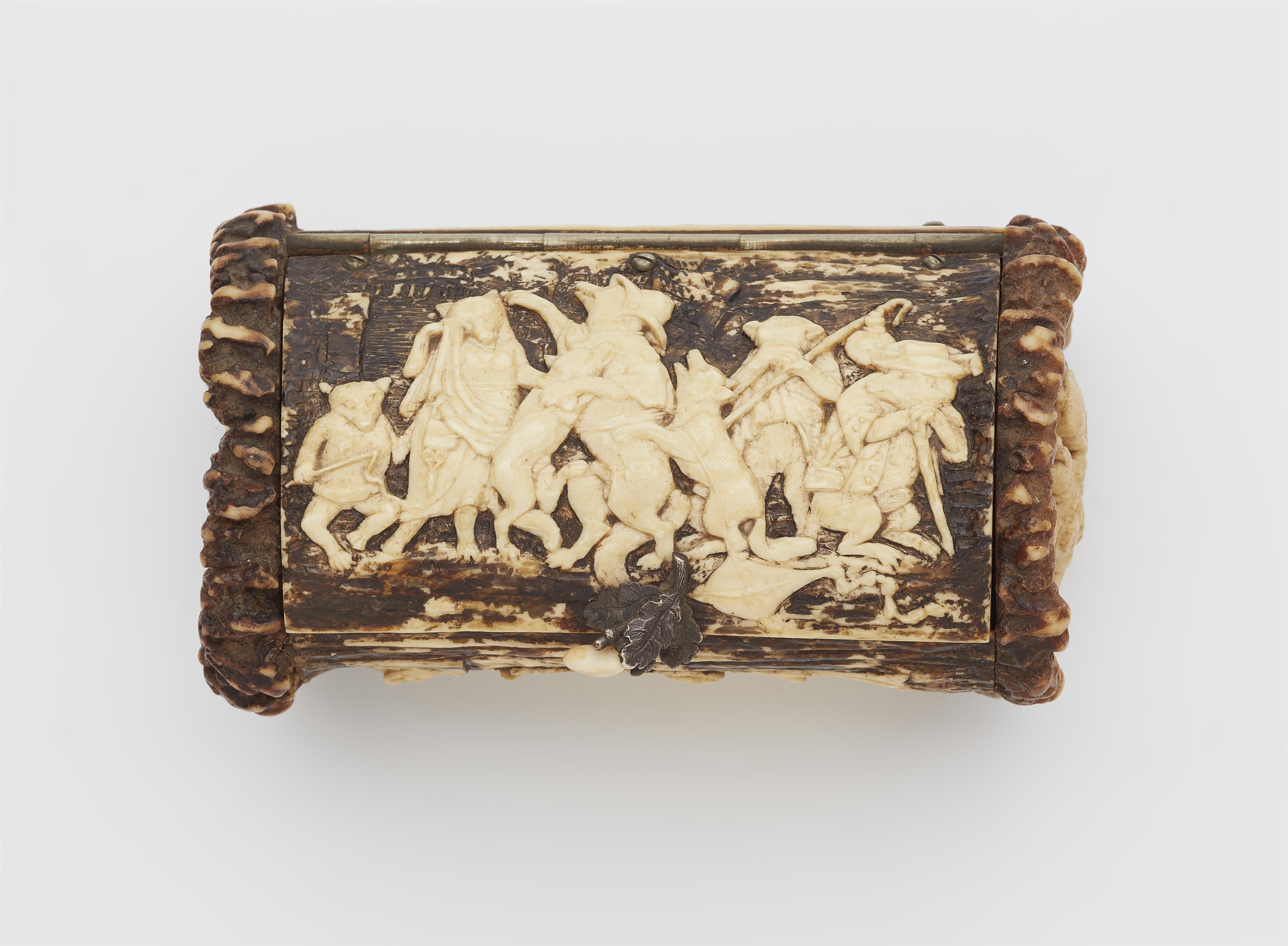 A carved antler box with zoomorphic reliefs - image-2