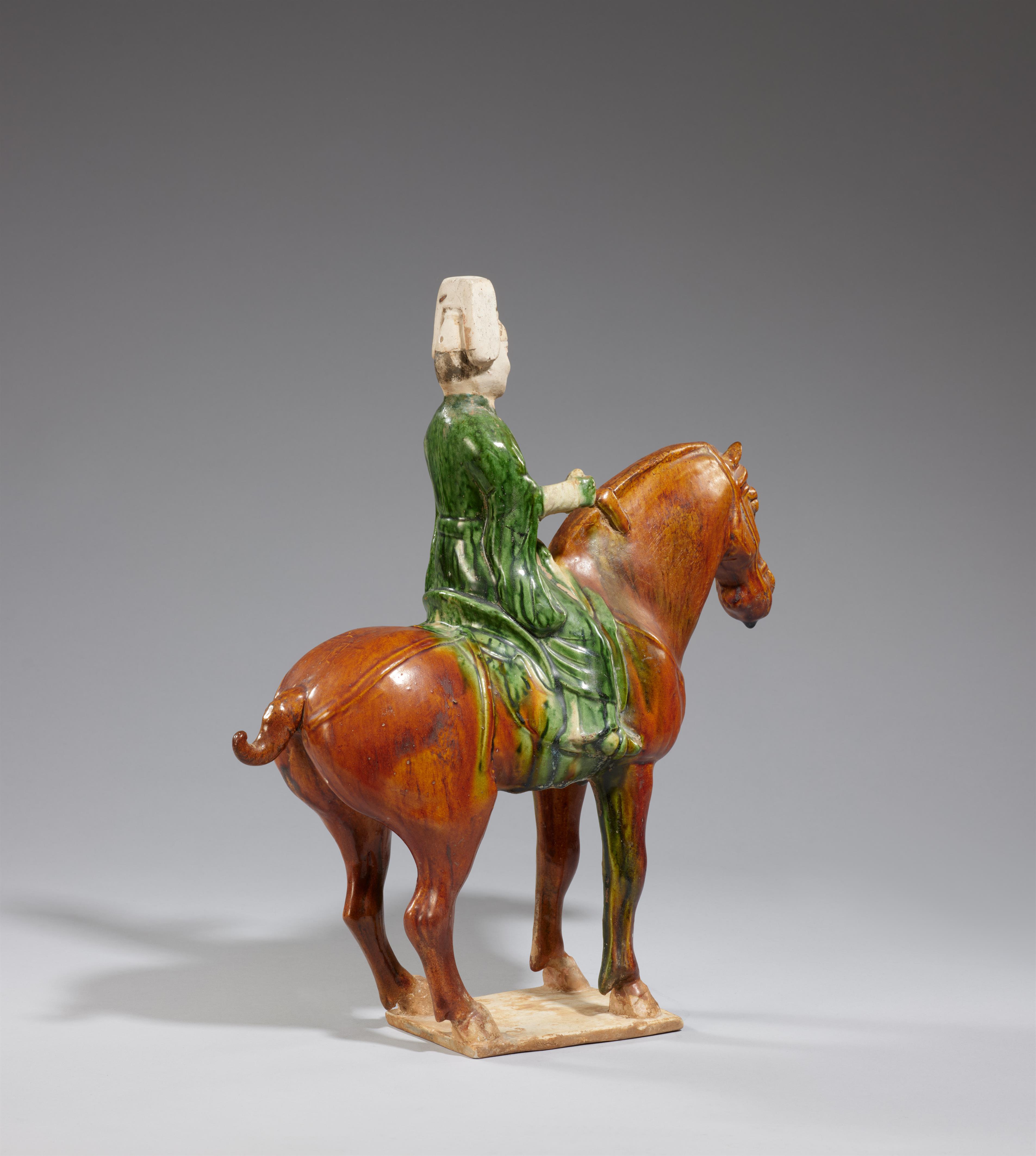 A sancai-glazed figure of a horse and rider. Tang dynasty (618-907) - image-2