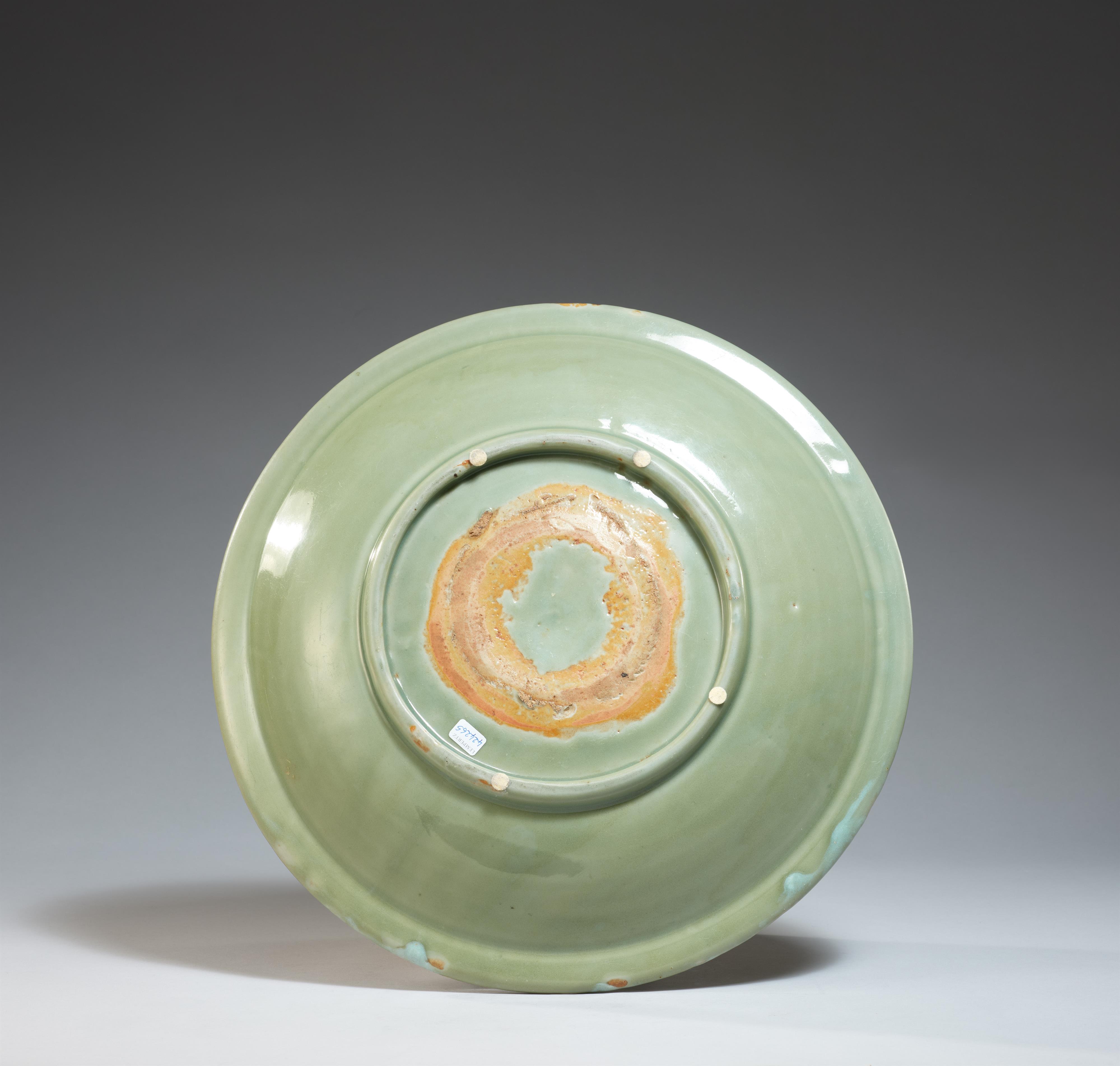 A large celadon charger. Ming dynasty, late 14th/early 15th century - image-2