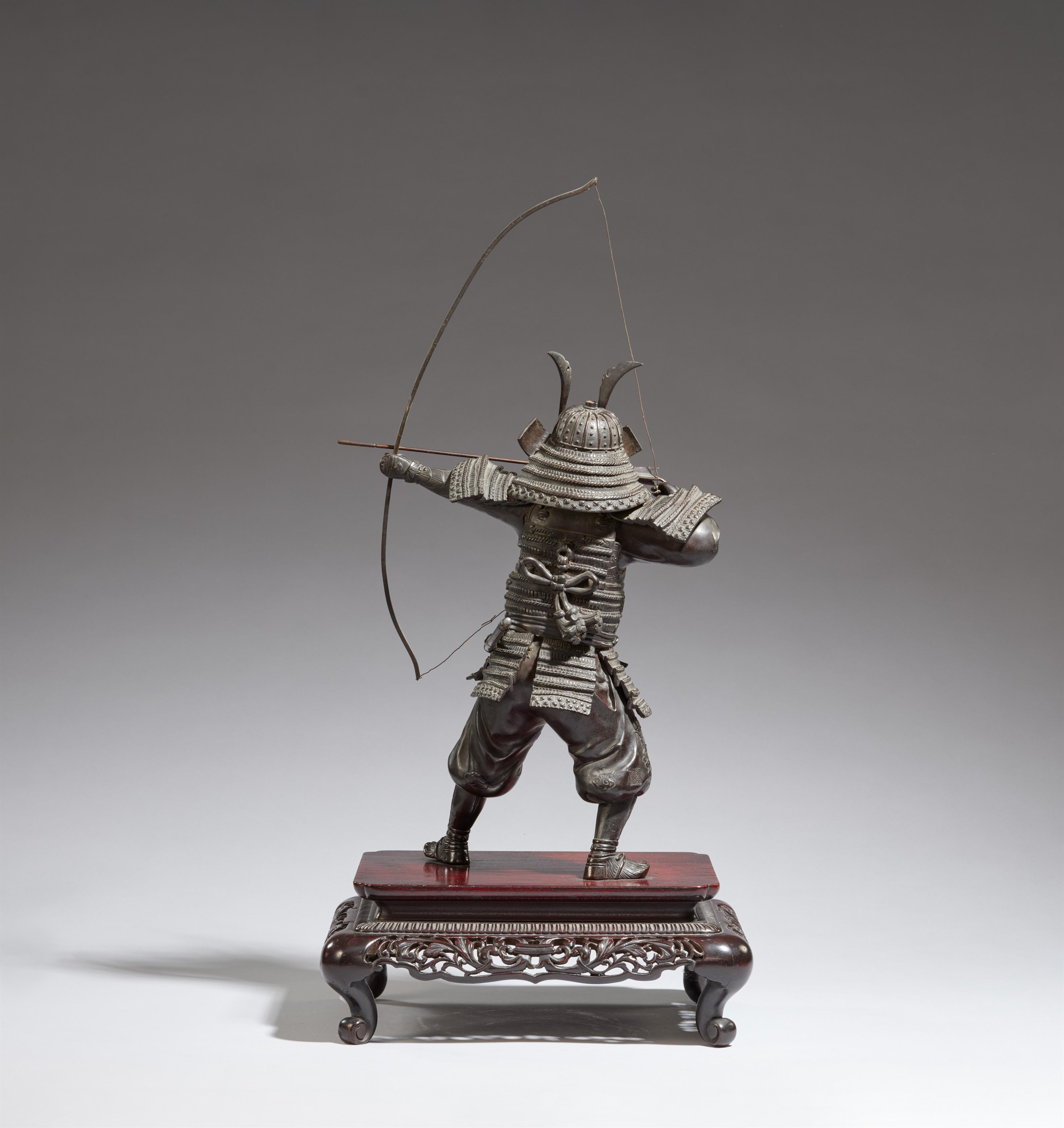 A bronze figure of a samurai on a wooden stand. Late 19th century - image-2