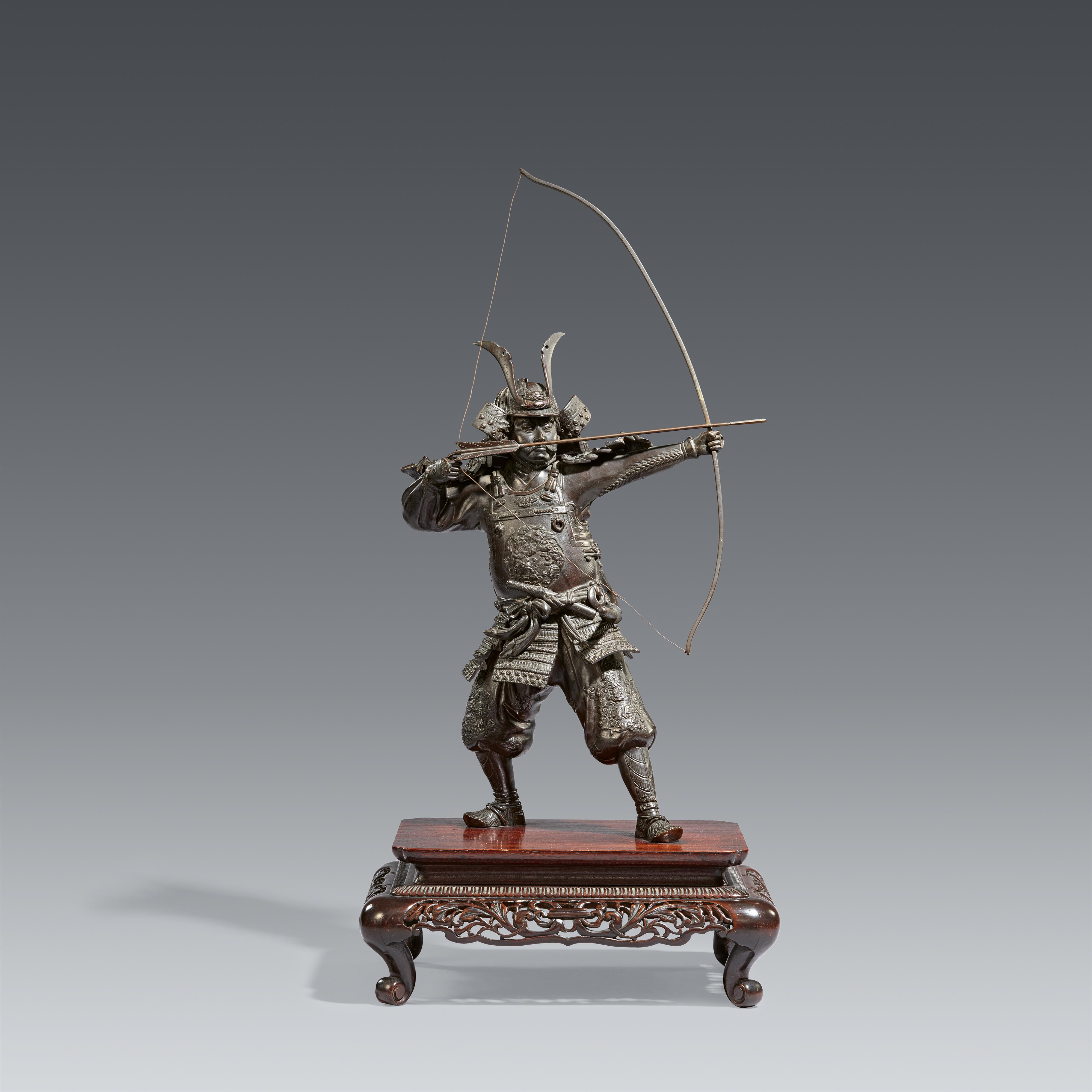 A bronze figure of a samurai on a wooden stand. Late 19th century - image-1