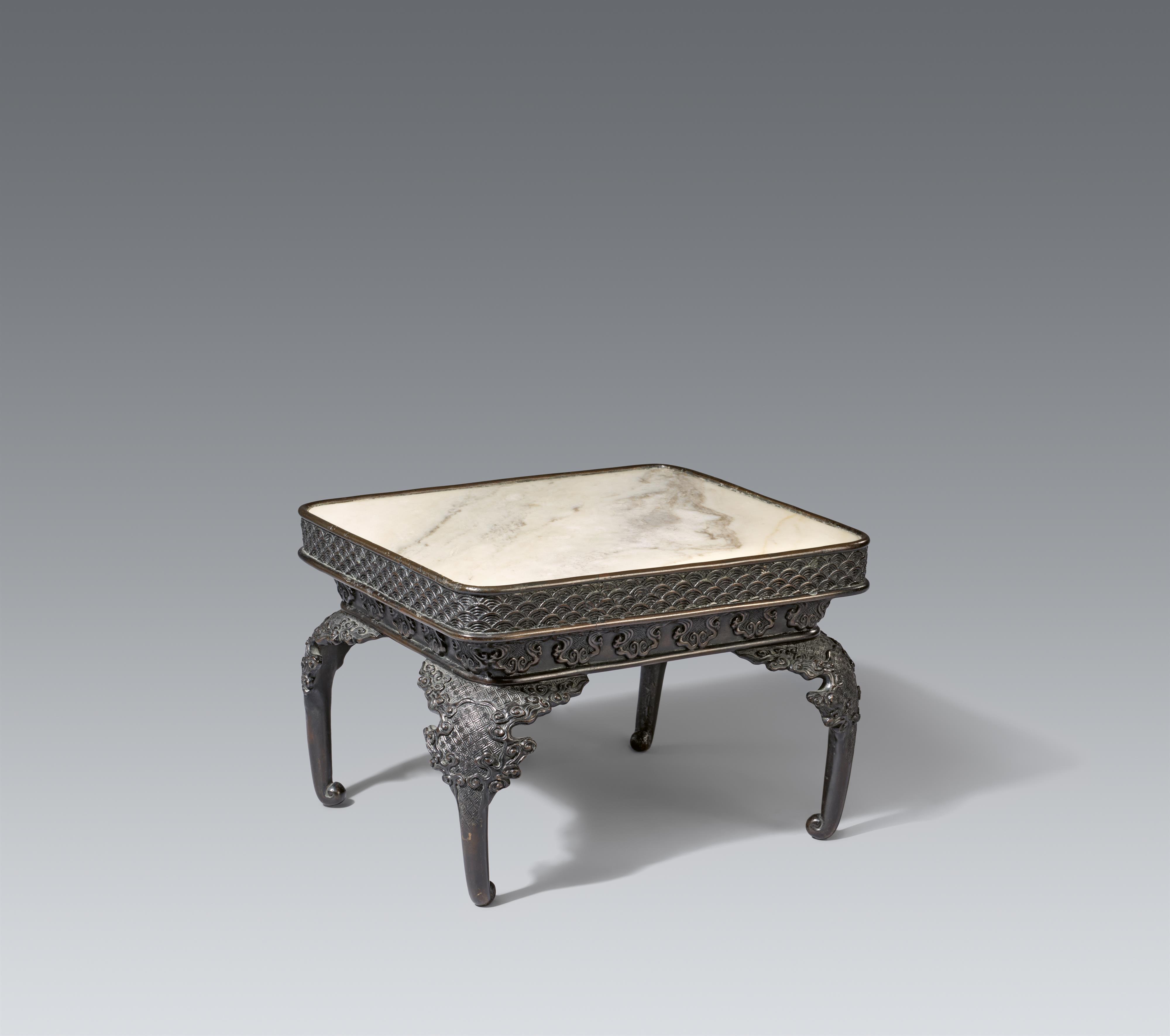 A bronze and marble stand in form of a small Chinese table. First half 20th century - image-1