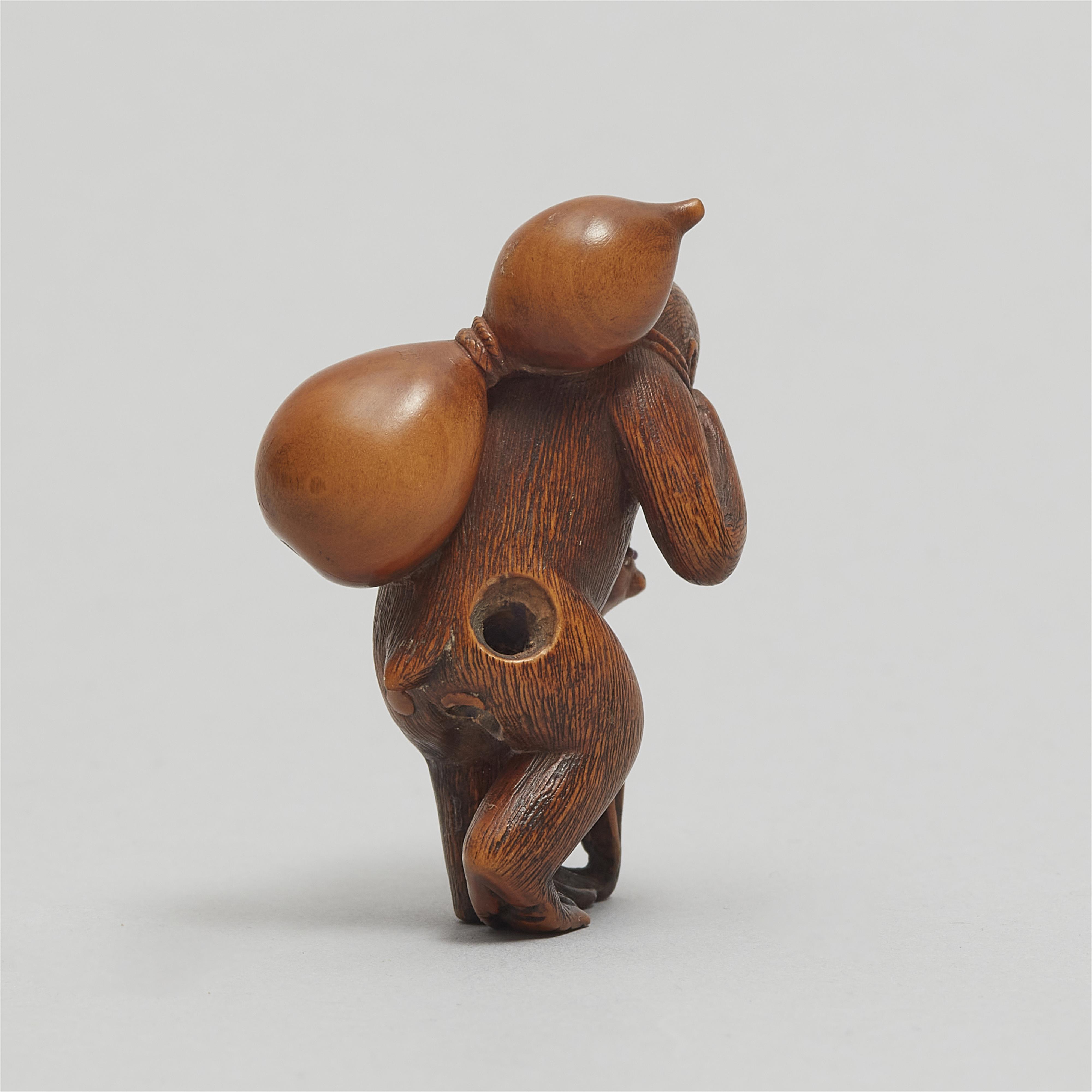 A boxwood netsuke of a monkey with a large gourd. Late 19th century - image-5