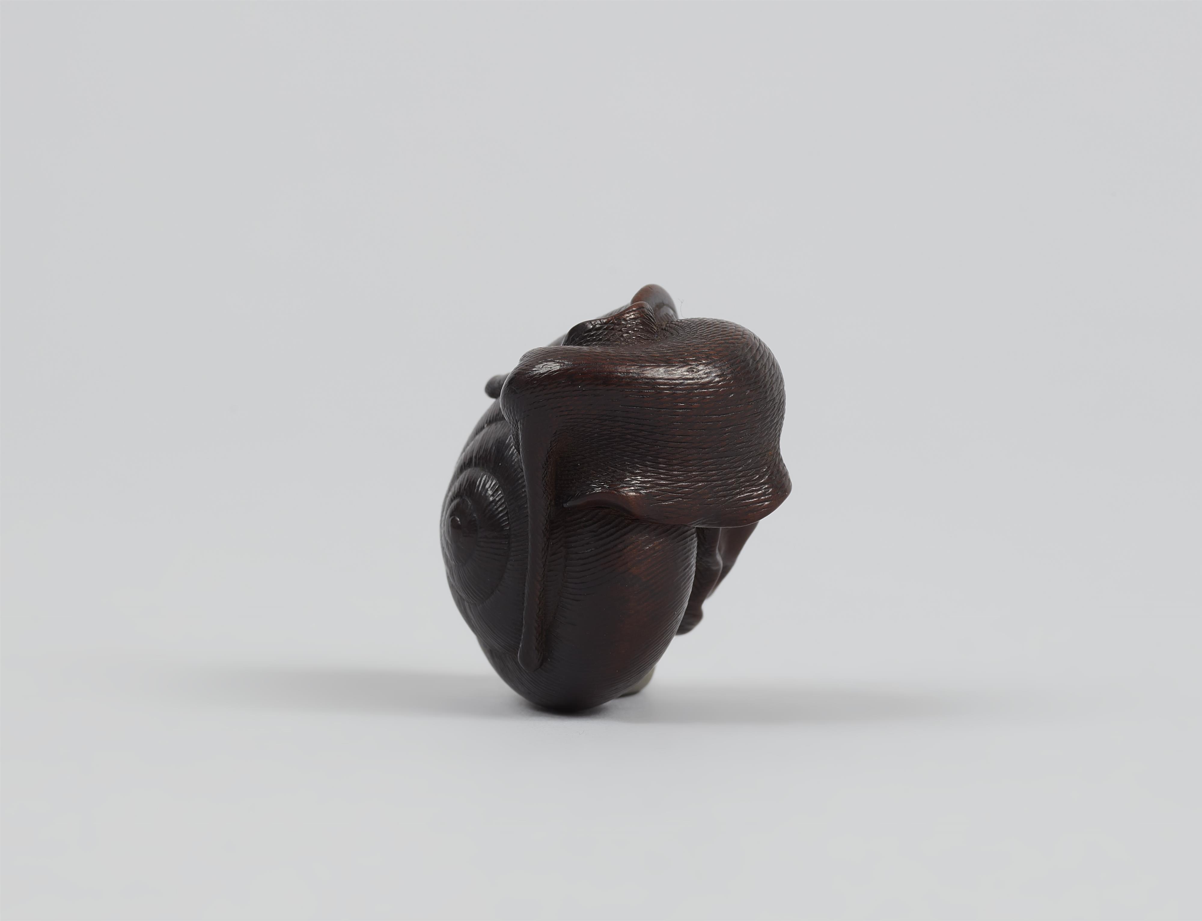 A dark stained boxwood netsuke of a snail. Nagoya. Mid-19th century - image-6