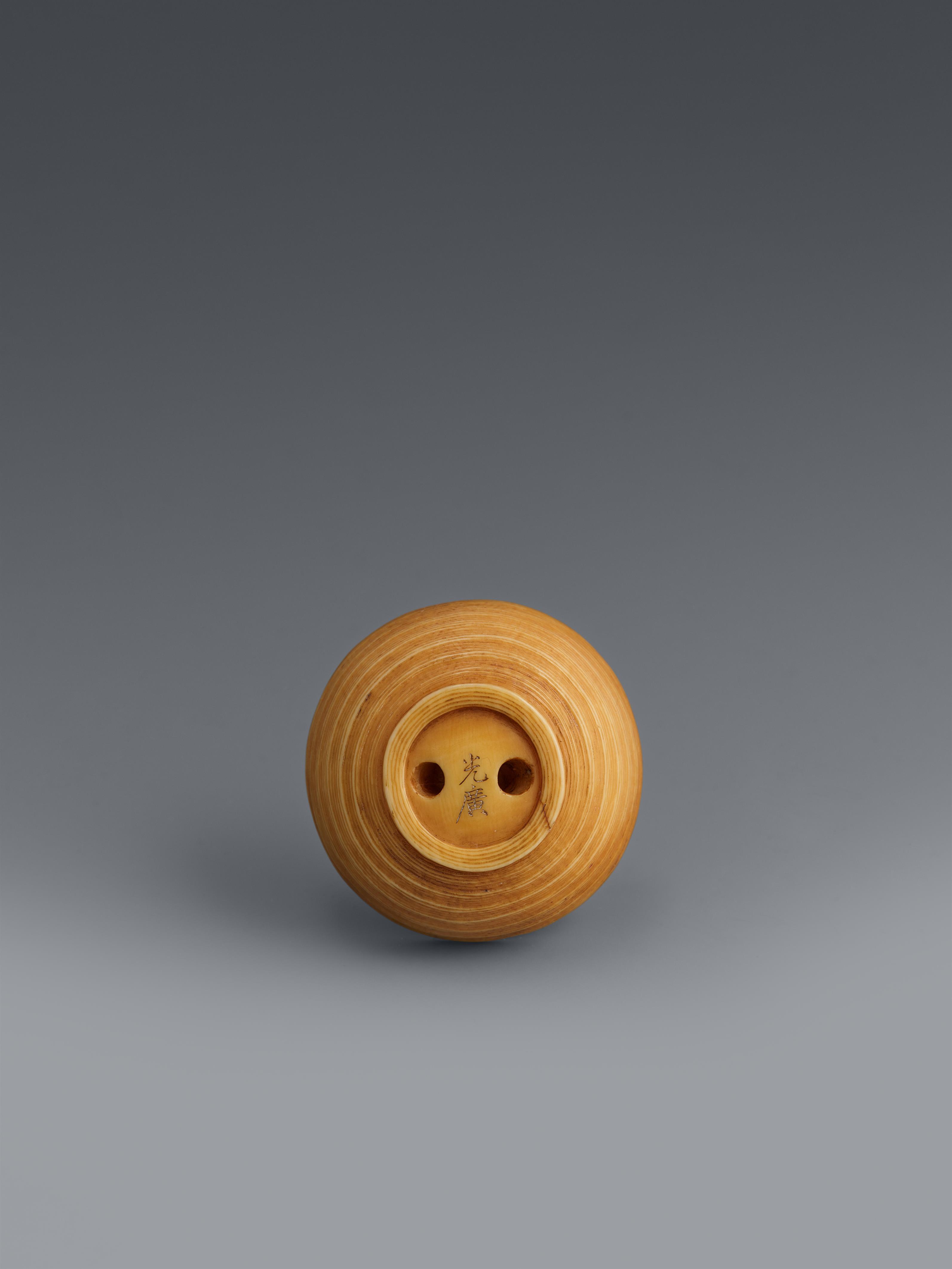 An Osaka lightly stained ivory netsuke of a Otafuku mask in a bowl. Mid-19th century - image-3