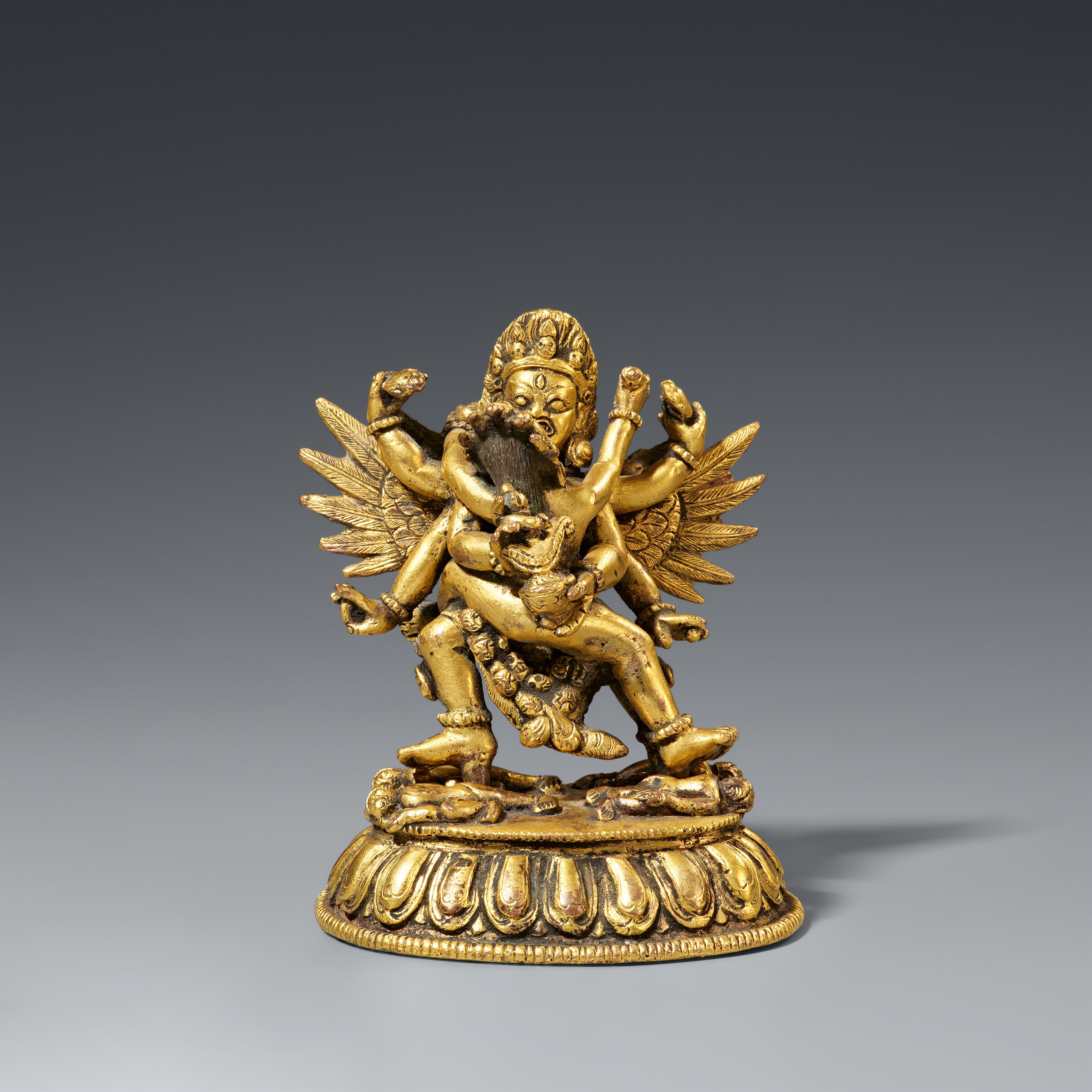 A Tibetan fire-gilt bronze figure of Hayagriva in yab-yum. 19th century - image-1