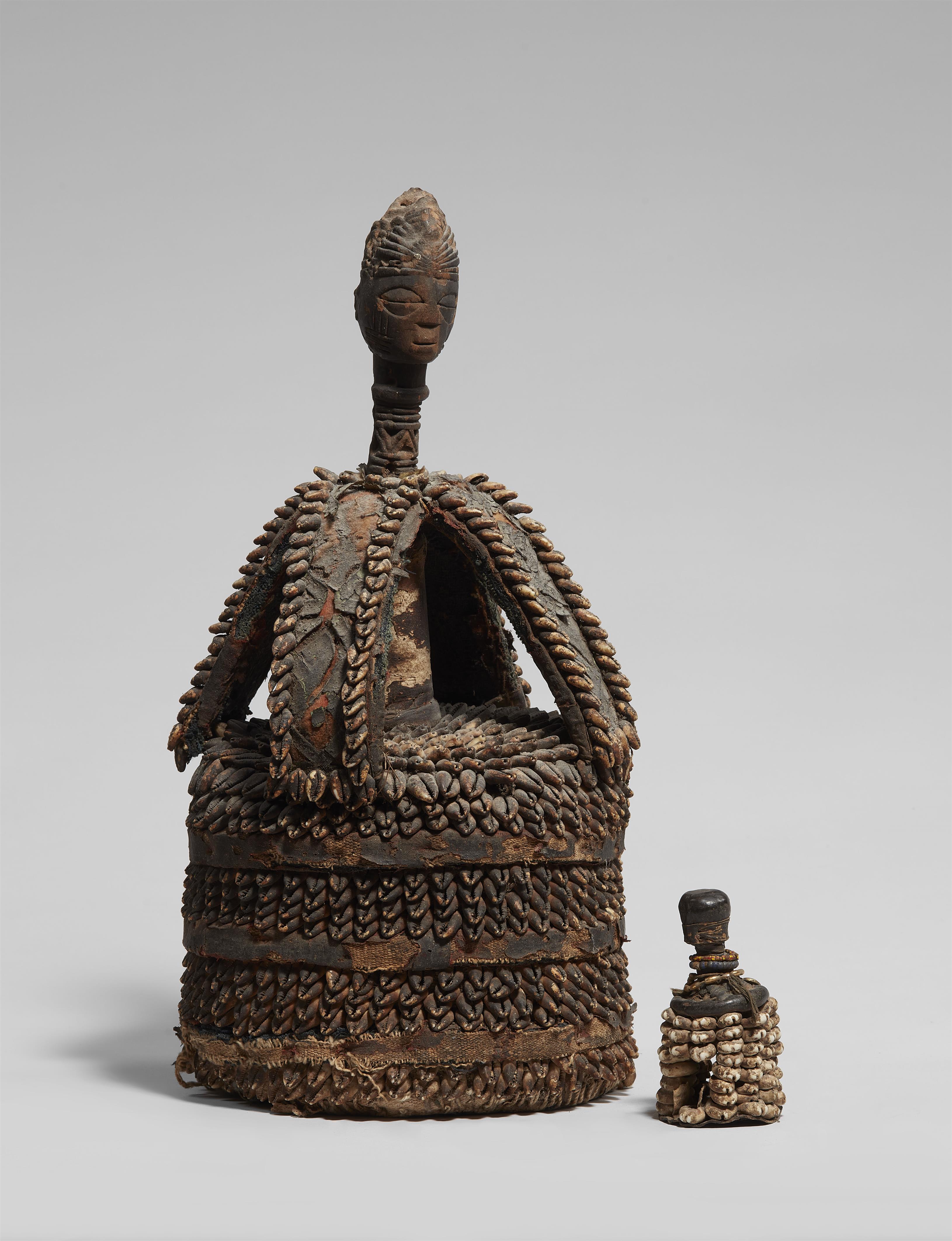 YORUBA HOUSE OF HEAD 
ile ori - image-1