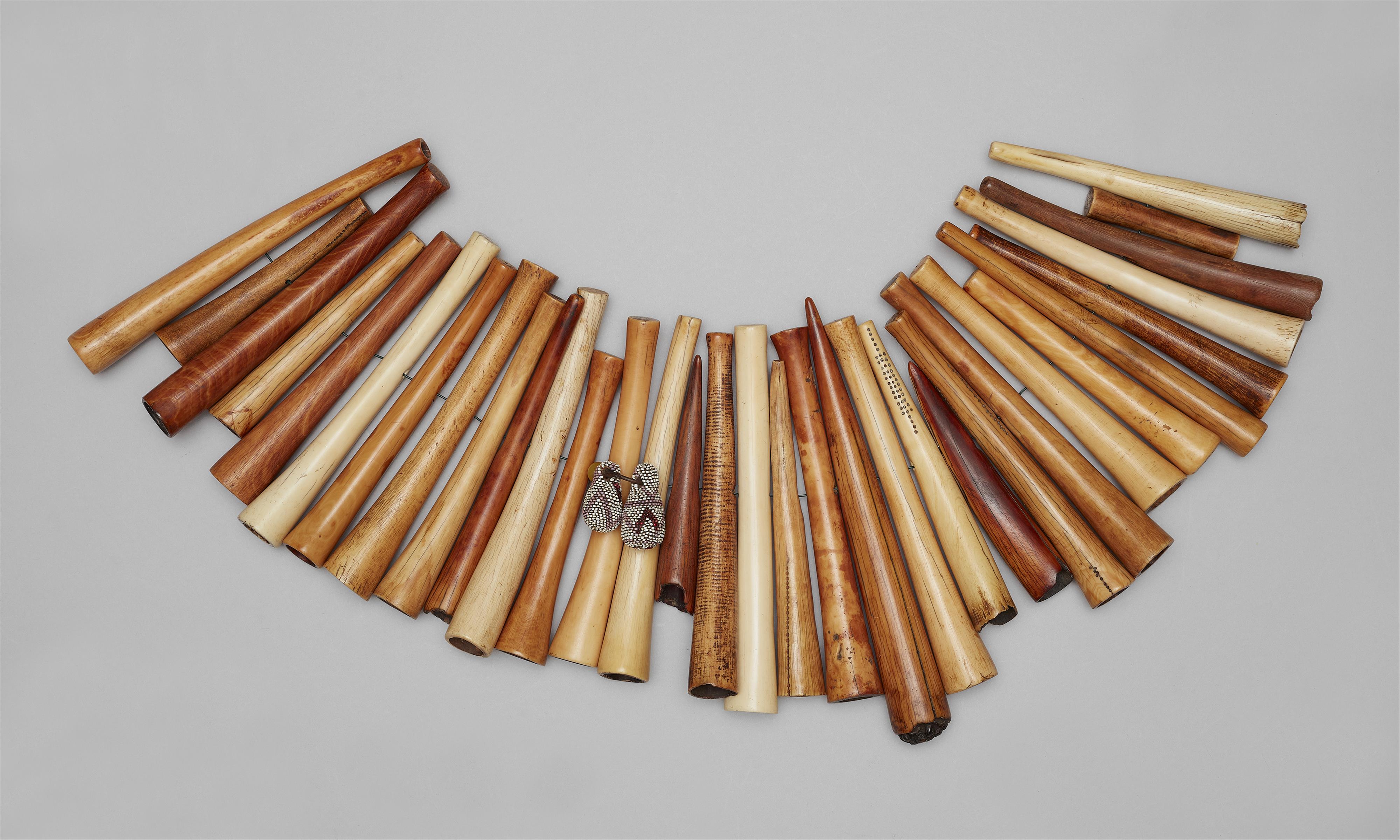 GROUP OF THIRTY-THREE SHI IVORY AMULETS
muroha - image-1