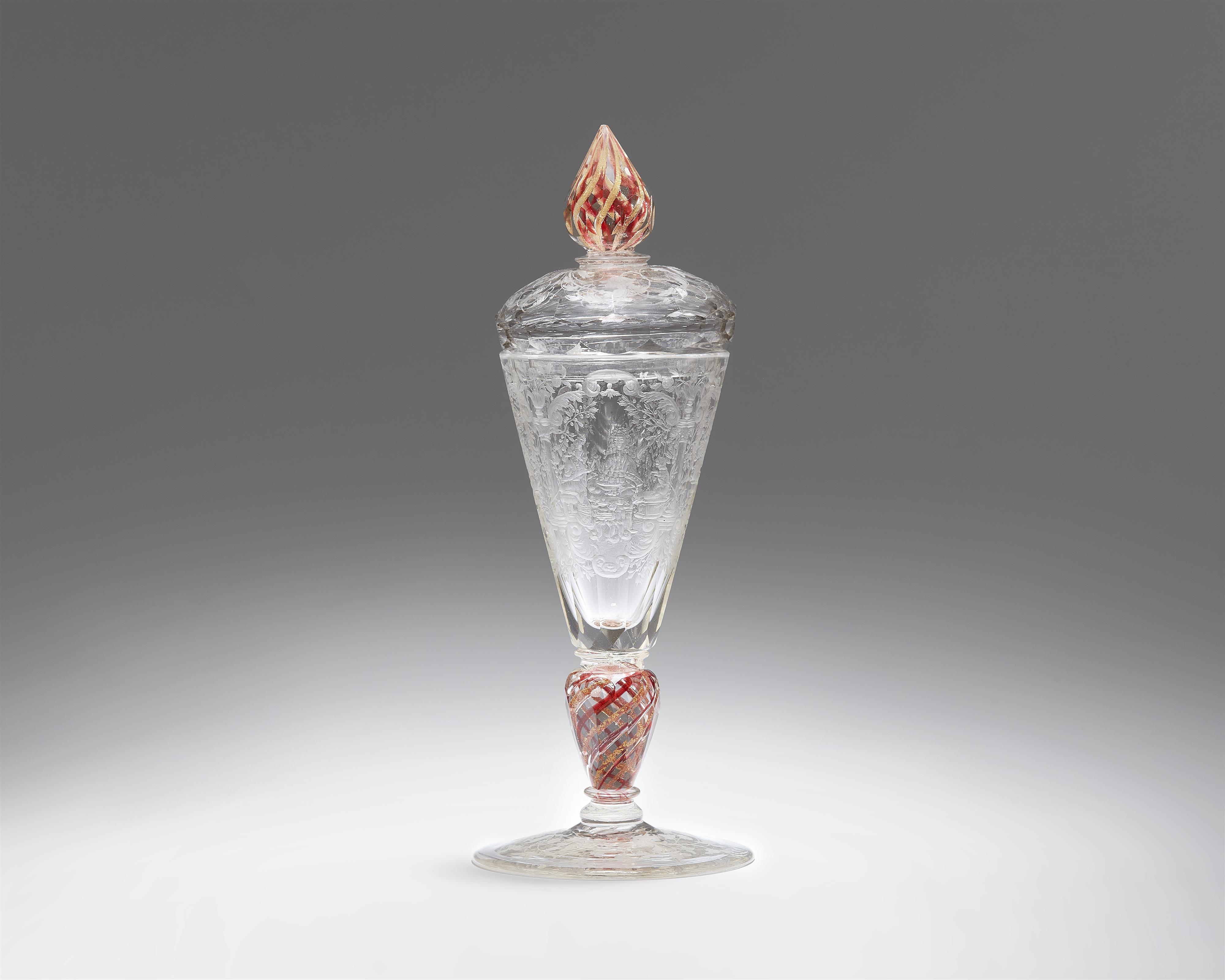 A cut glass goblet with a courtly banquet scene - image-1