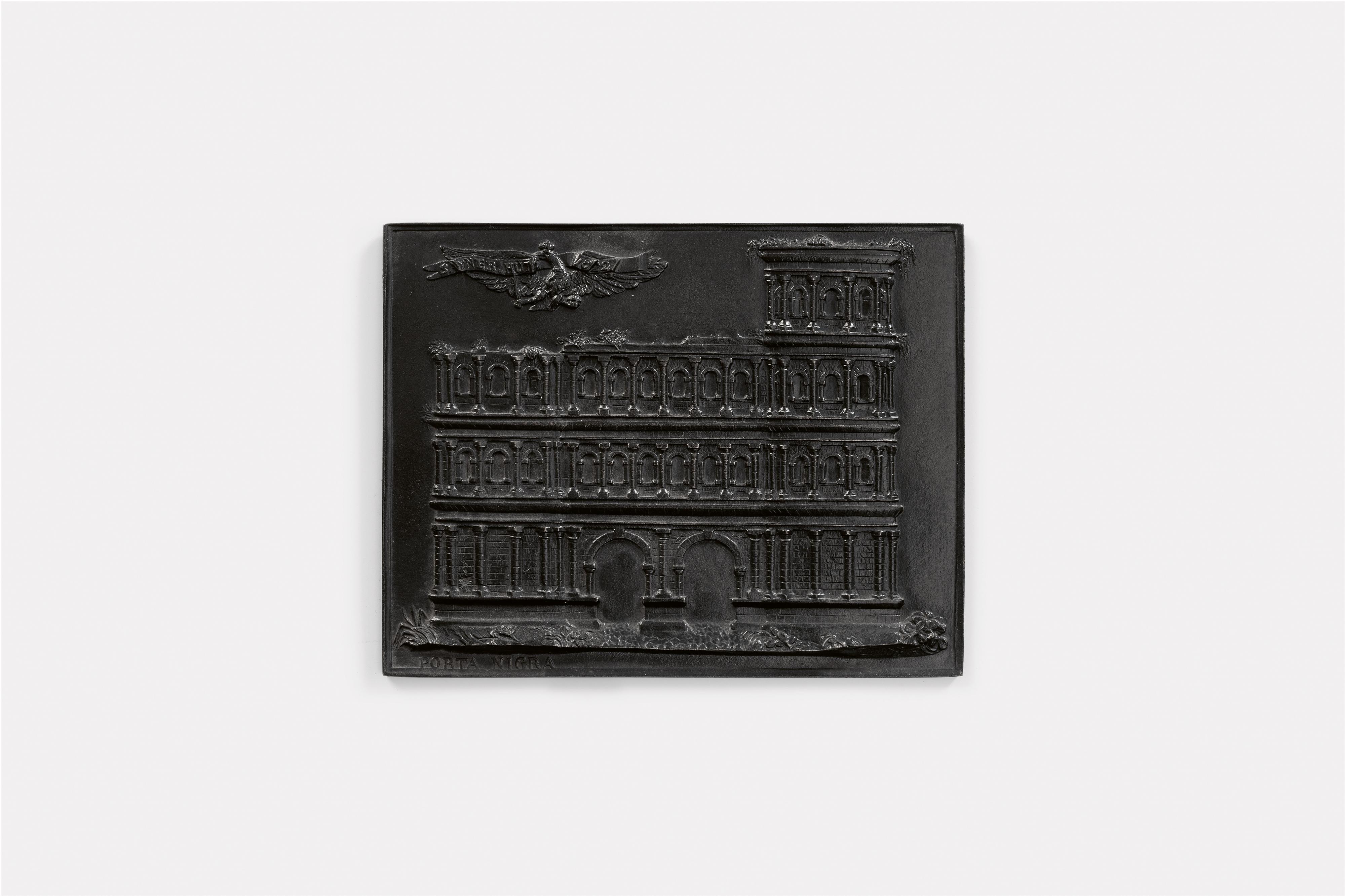 A cast iron New Year's plaque inscribed "PORTA NIGRA" - image-1