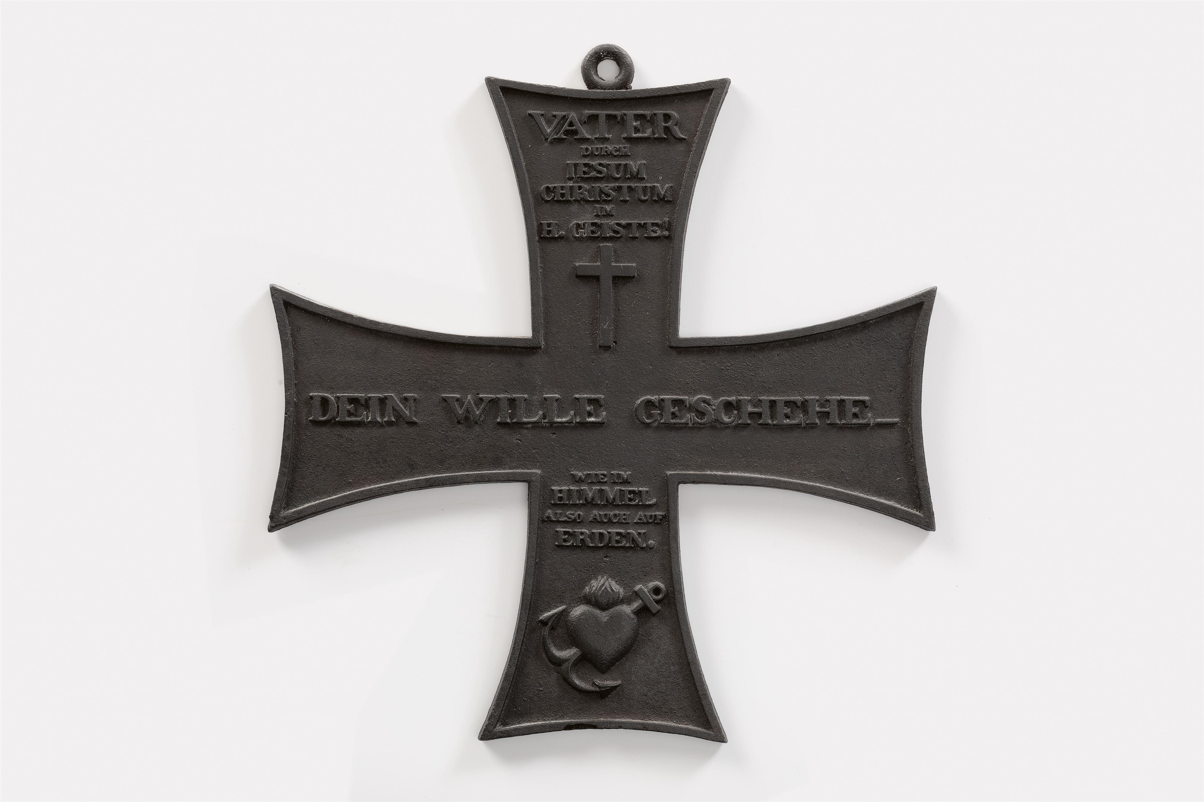 A cast iron wall plaque formed as the Iron Cross - image-1