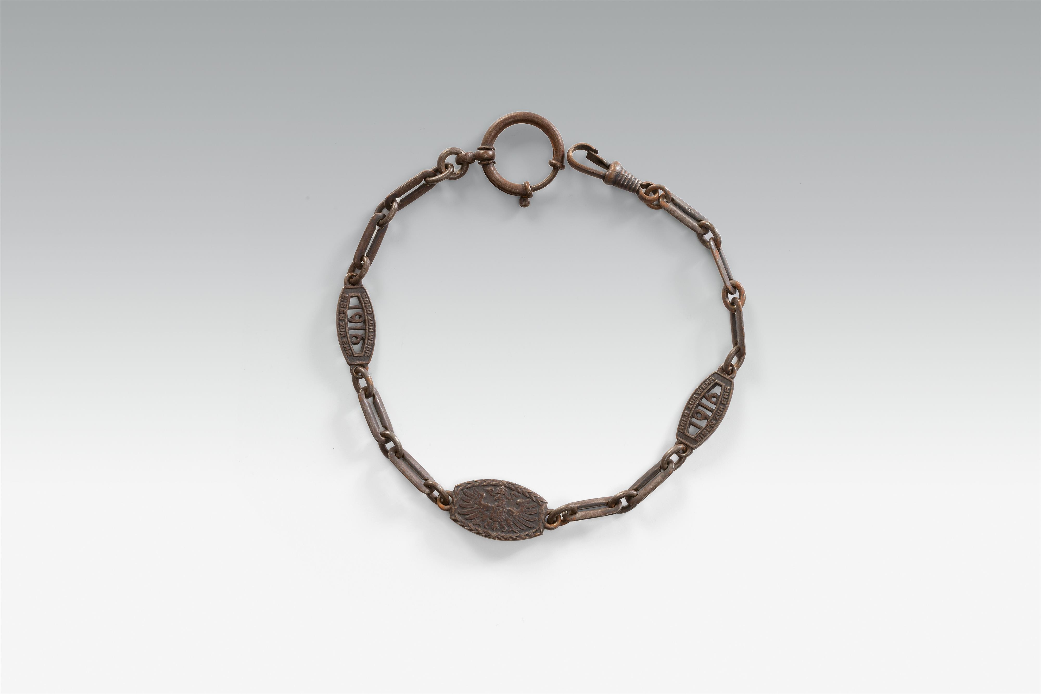 A cast iron necklace and patriotic watch chain - image-2