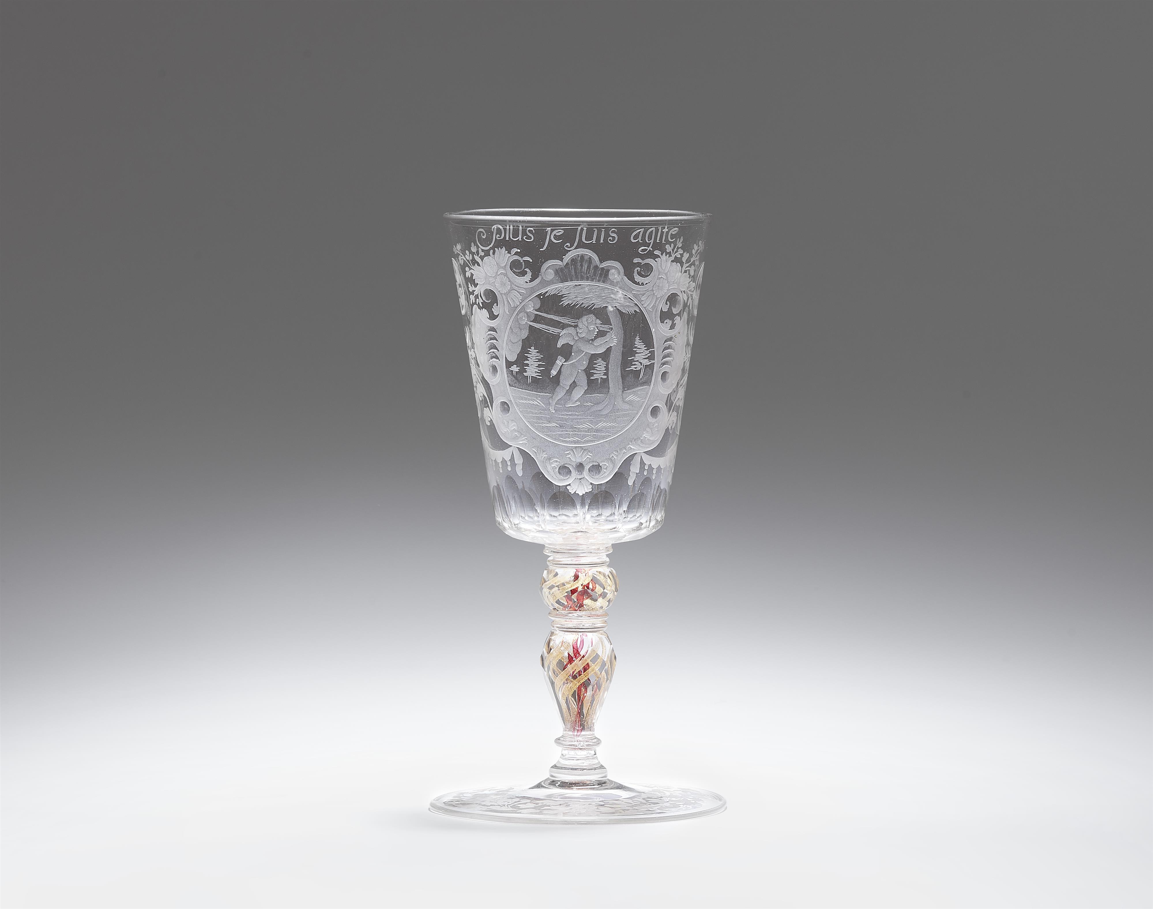 A cut glass goblet inscribed "Plus je suis agite" - image-1