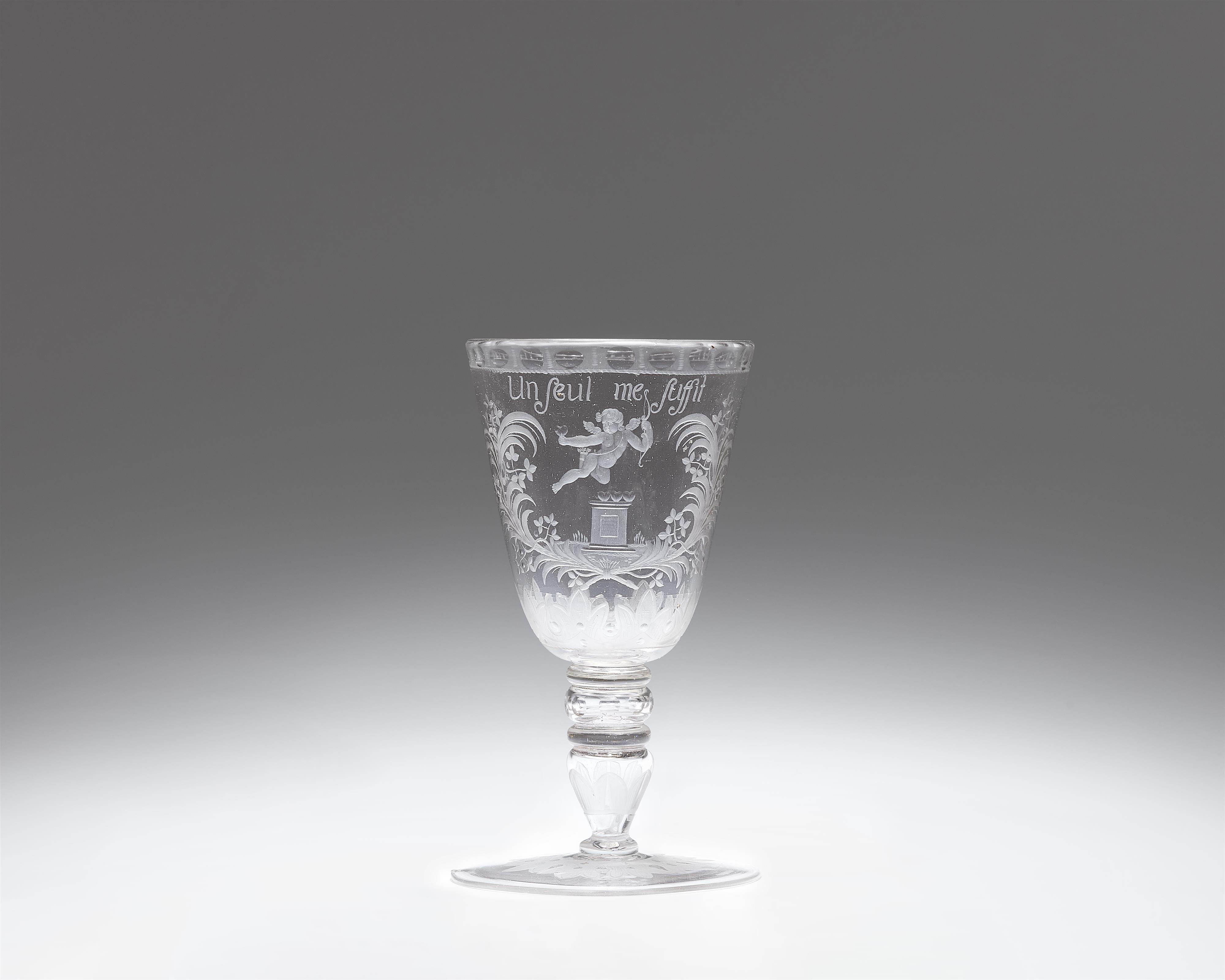 A cut glass goblet inscribed "Un seul me suffit" - image-1