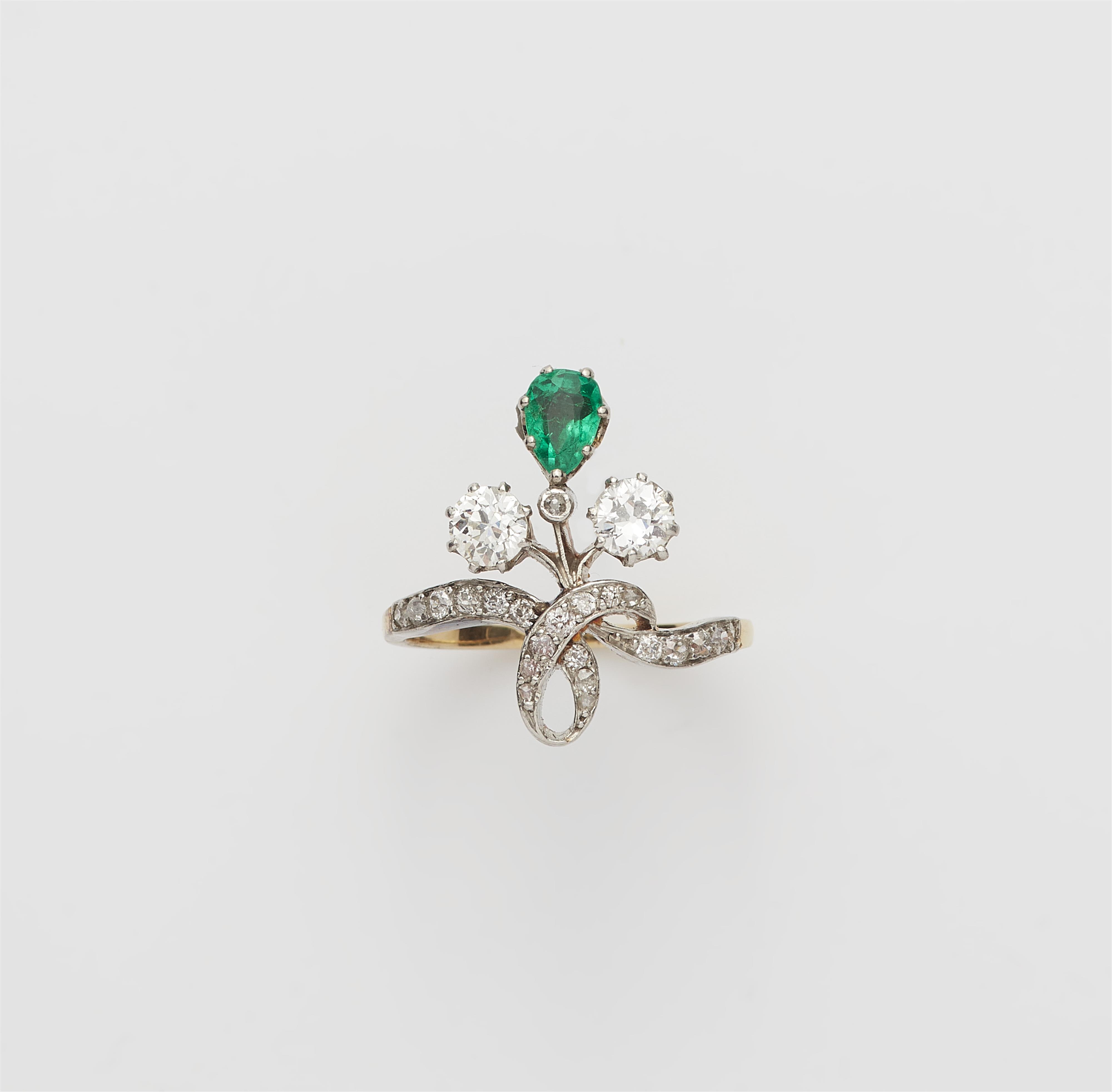 A Belle Epoque 18k gold diamond and emerald ring. - image-1