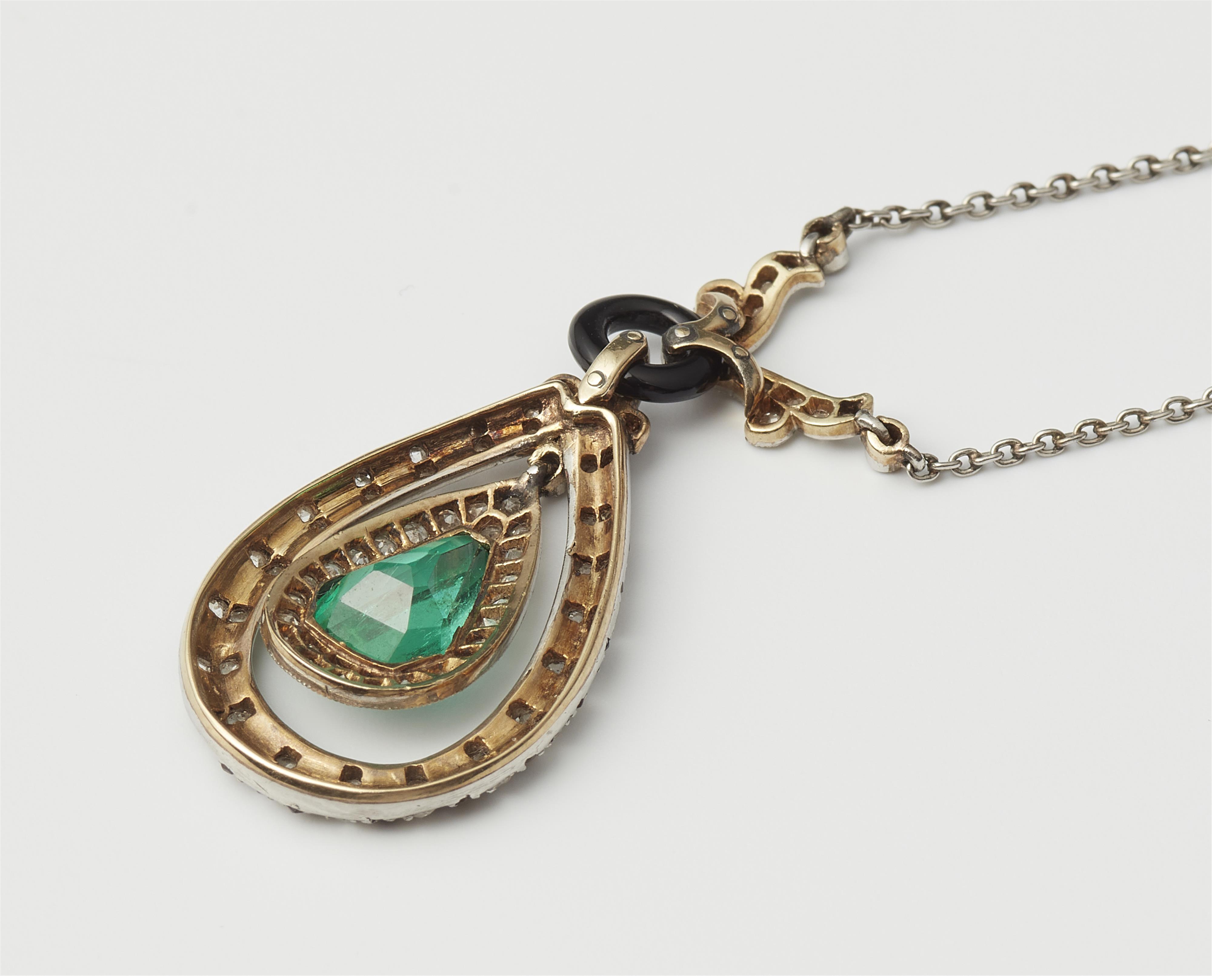 A platinum and 14k gold black enamel diamond onyx and emerald Art Déco pendant necklace. - image-3