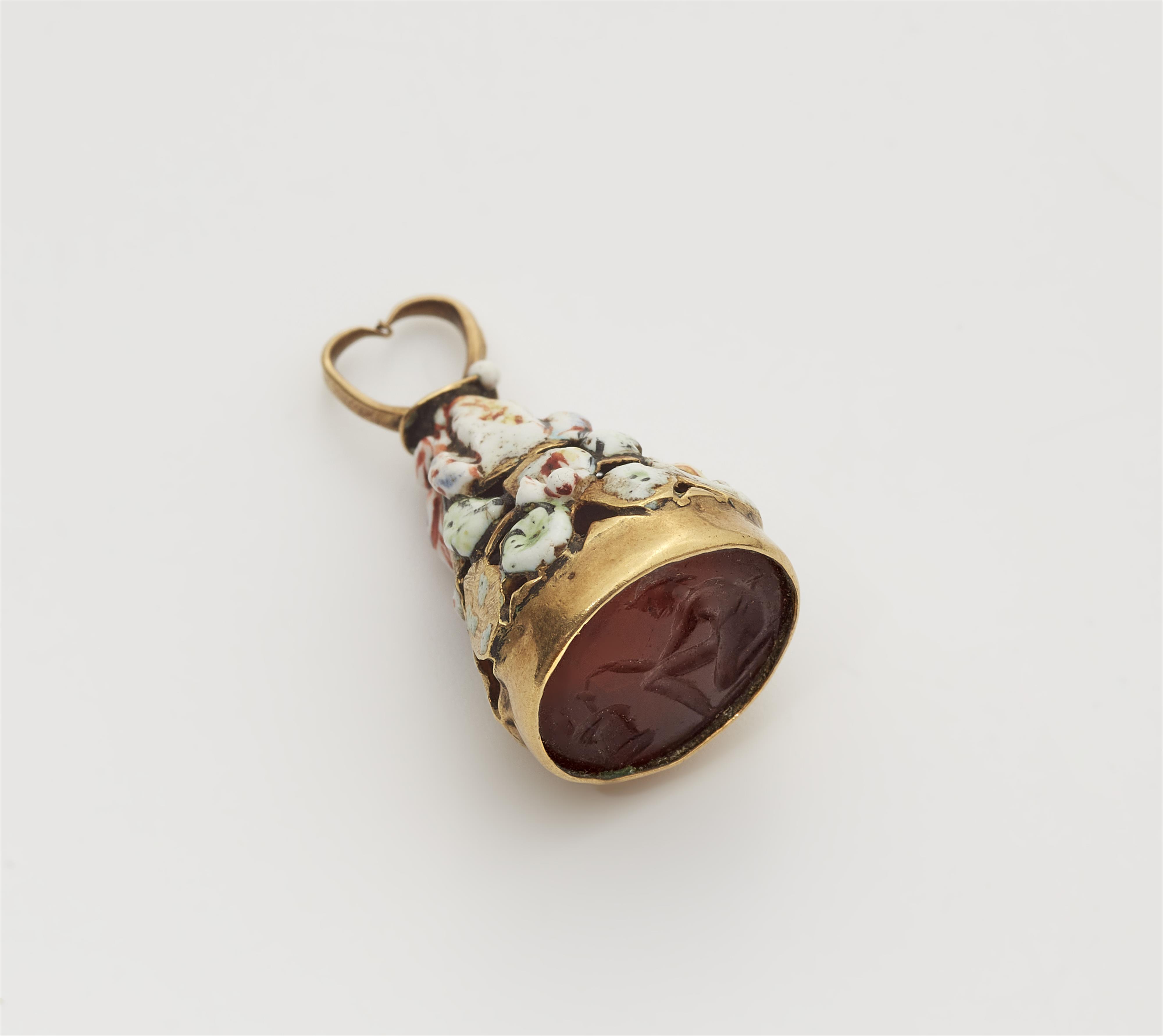 A possibly French gold and enamel breloque with an ancient Roman carnelian intaglio. Within it's original case. - image-1