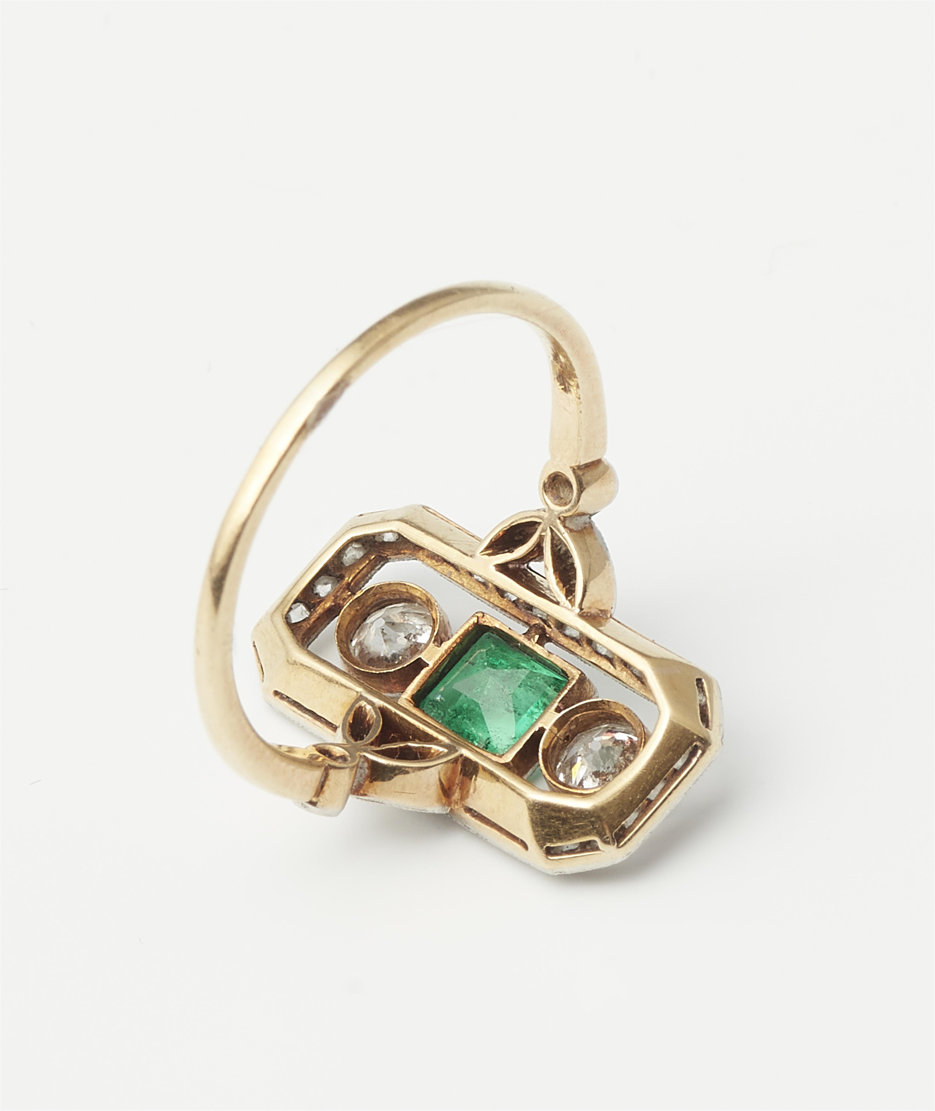 An Art Déco 14k gold platinum diamond and emerald ring. - image-2