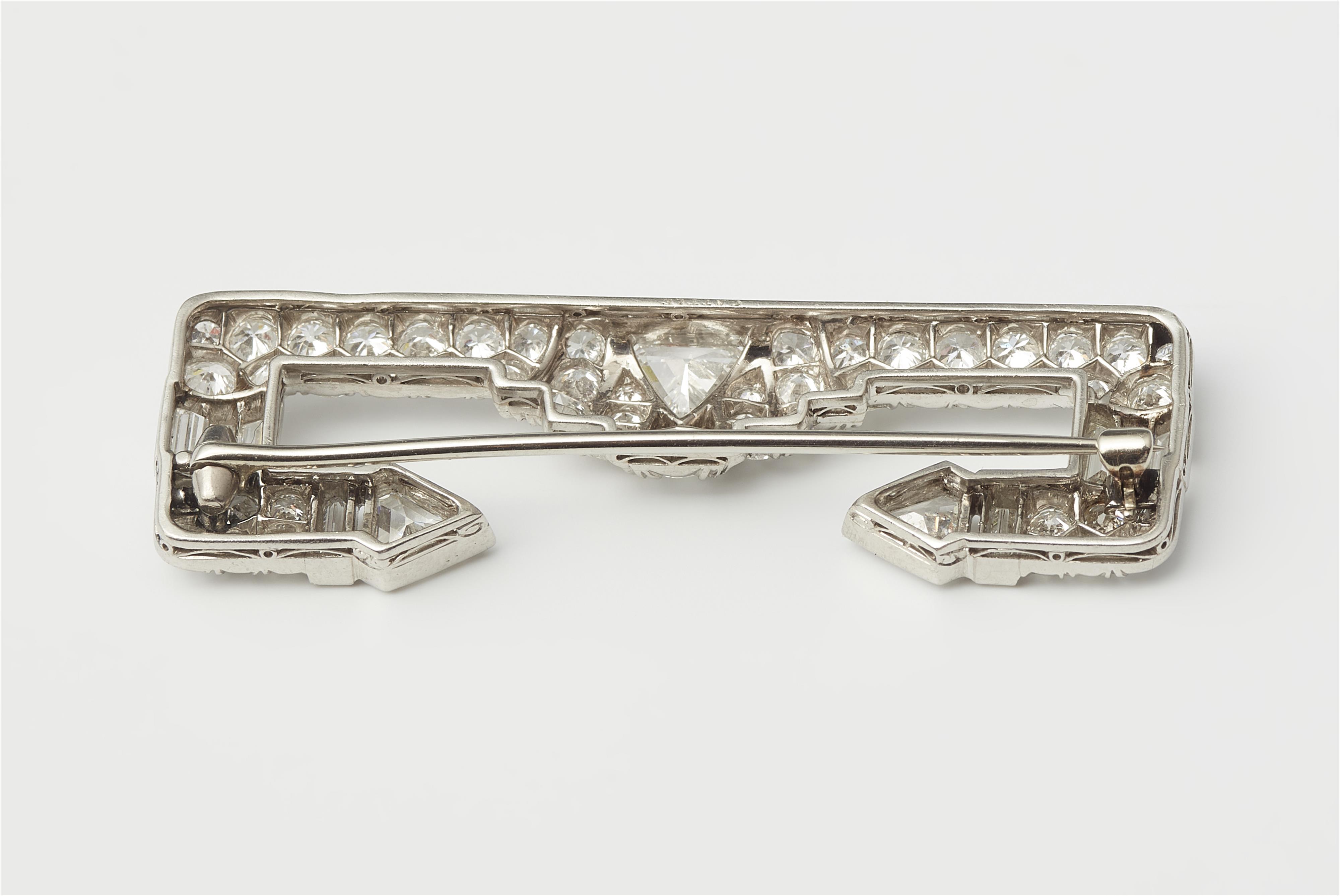 A platinum 18k white gold and diamond Art Déco brooch. - image-2