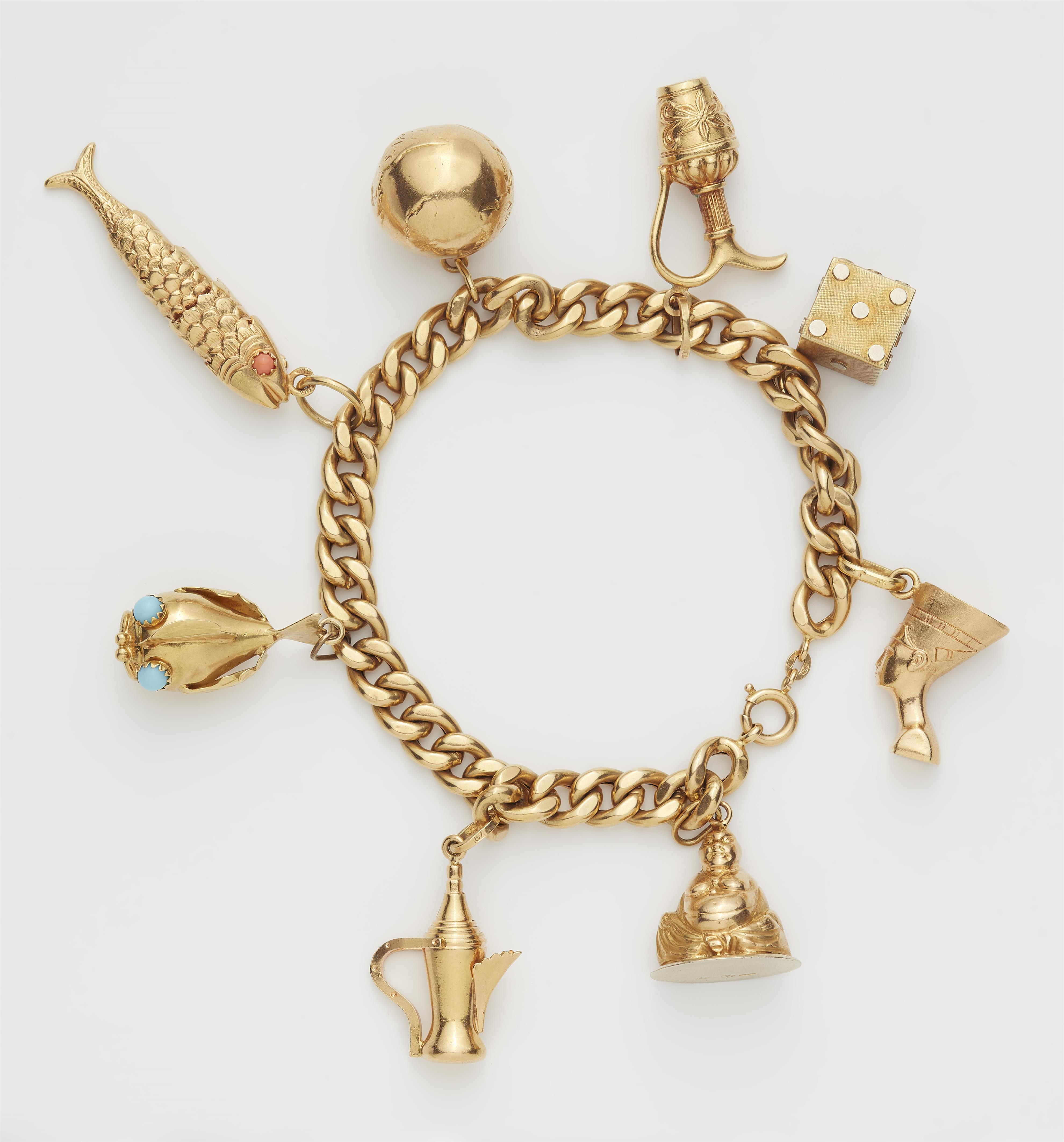 An Italian 18k gold charm bracelet. - image-1