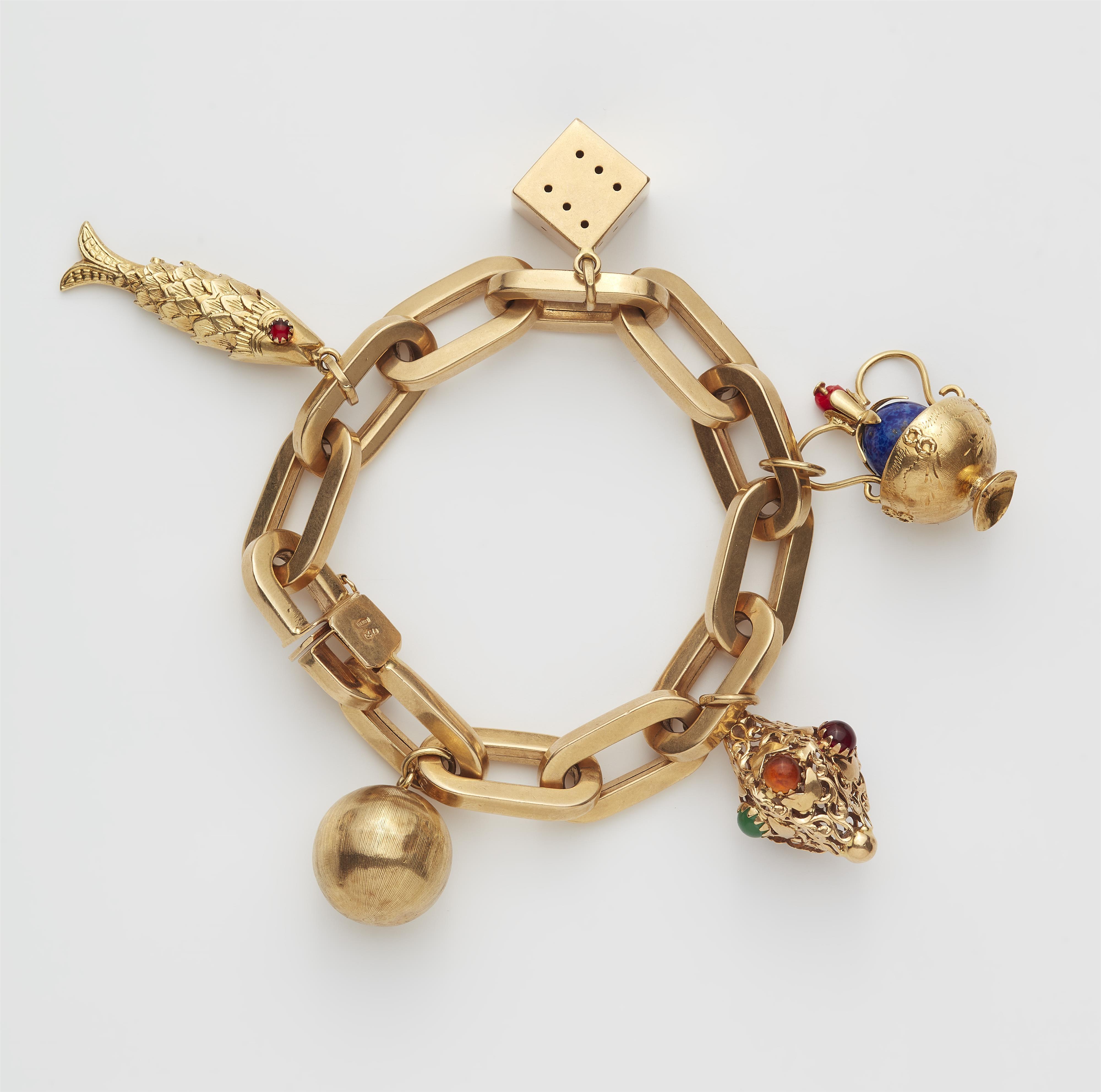 An Italian 18k gold and polychrome glass charm bracelet. - image-1