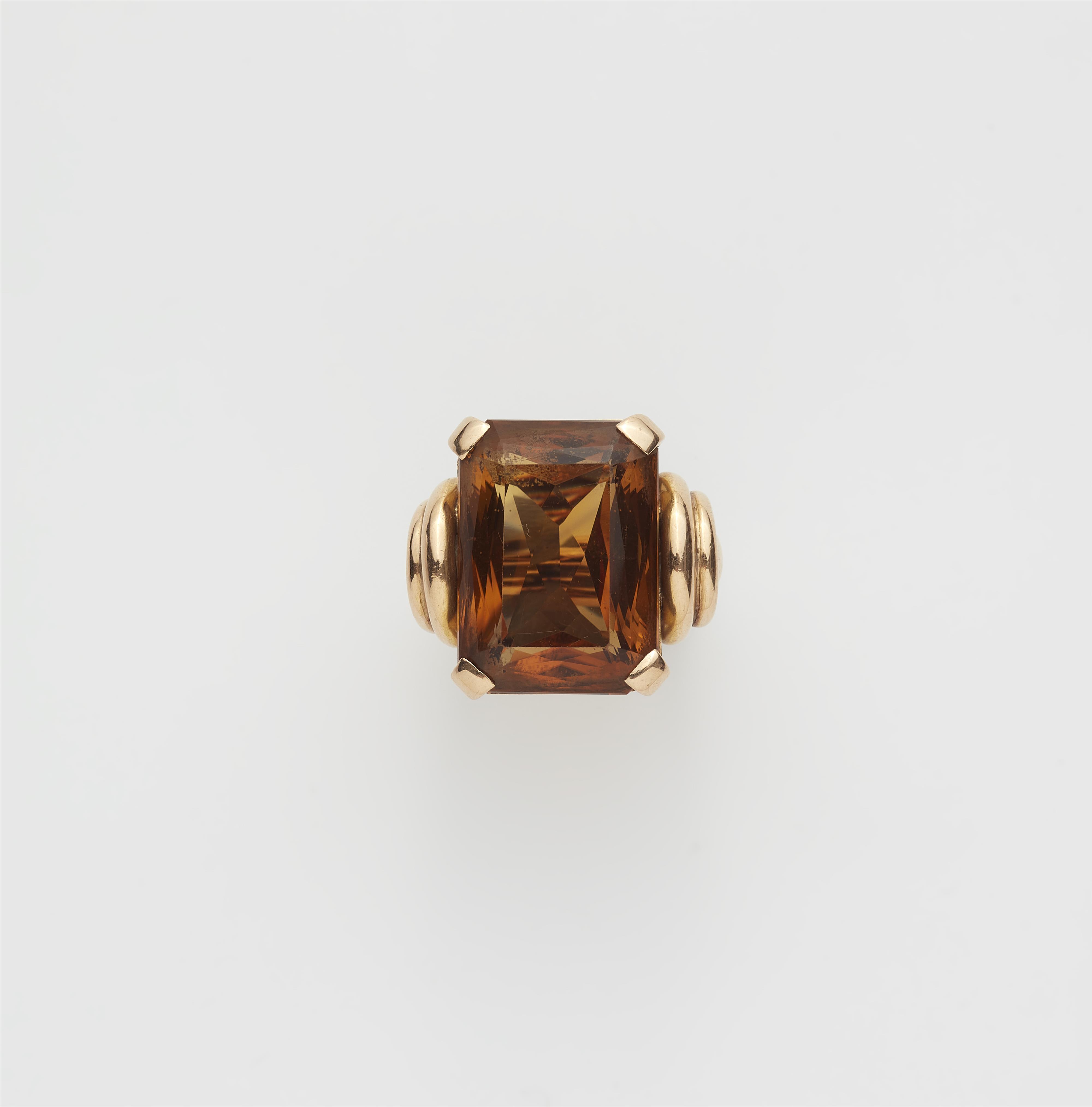 A Retro Style 18k rose gold and large cognac coloured citrine ring. - image-1