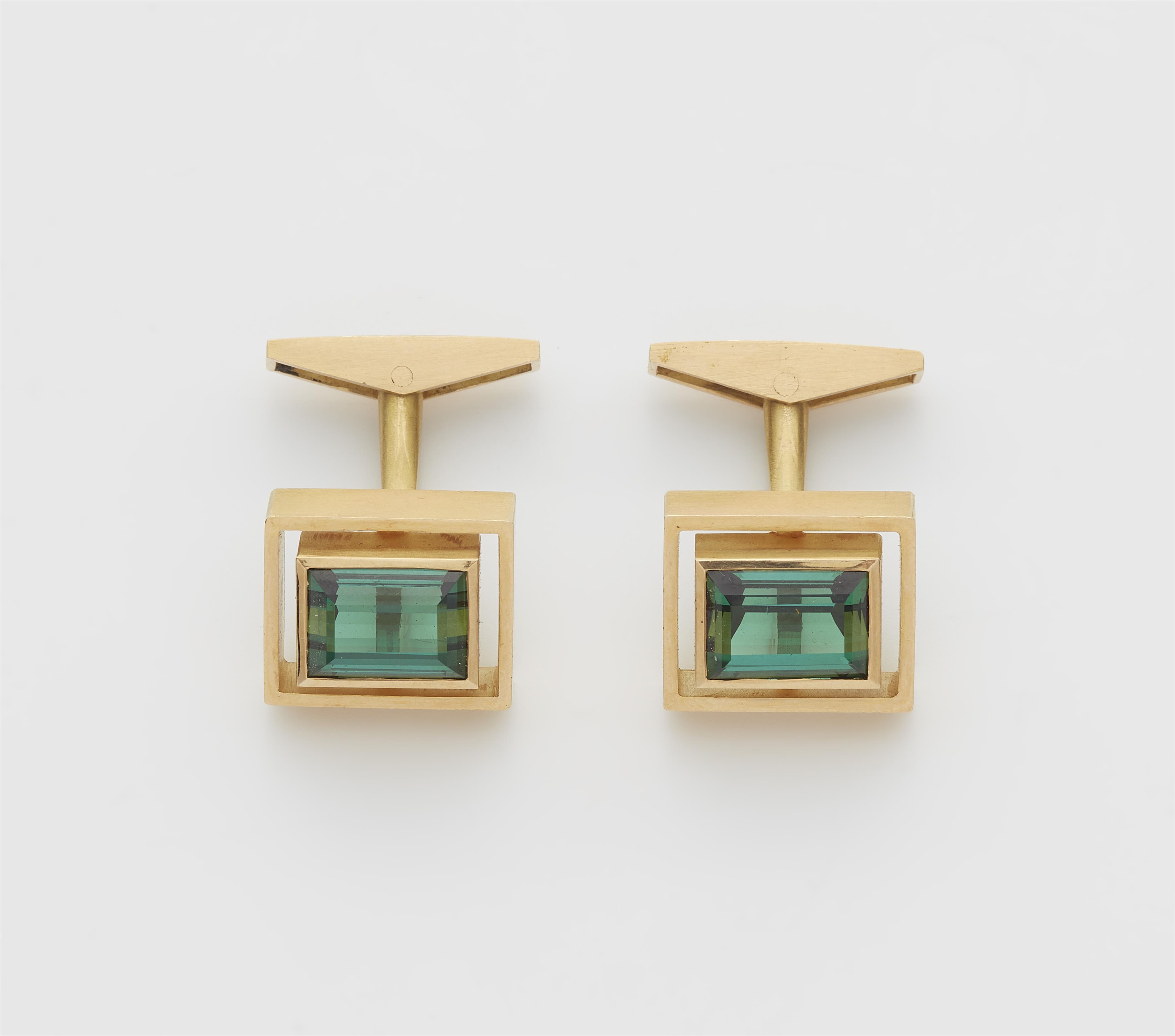 A pair of German 18k gold and green tourmaline cufflinks. - image-1