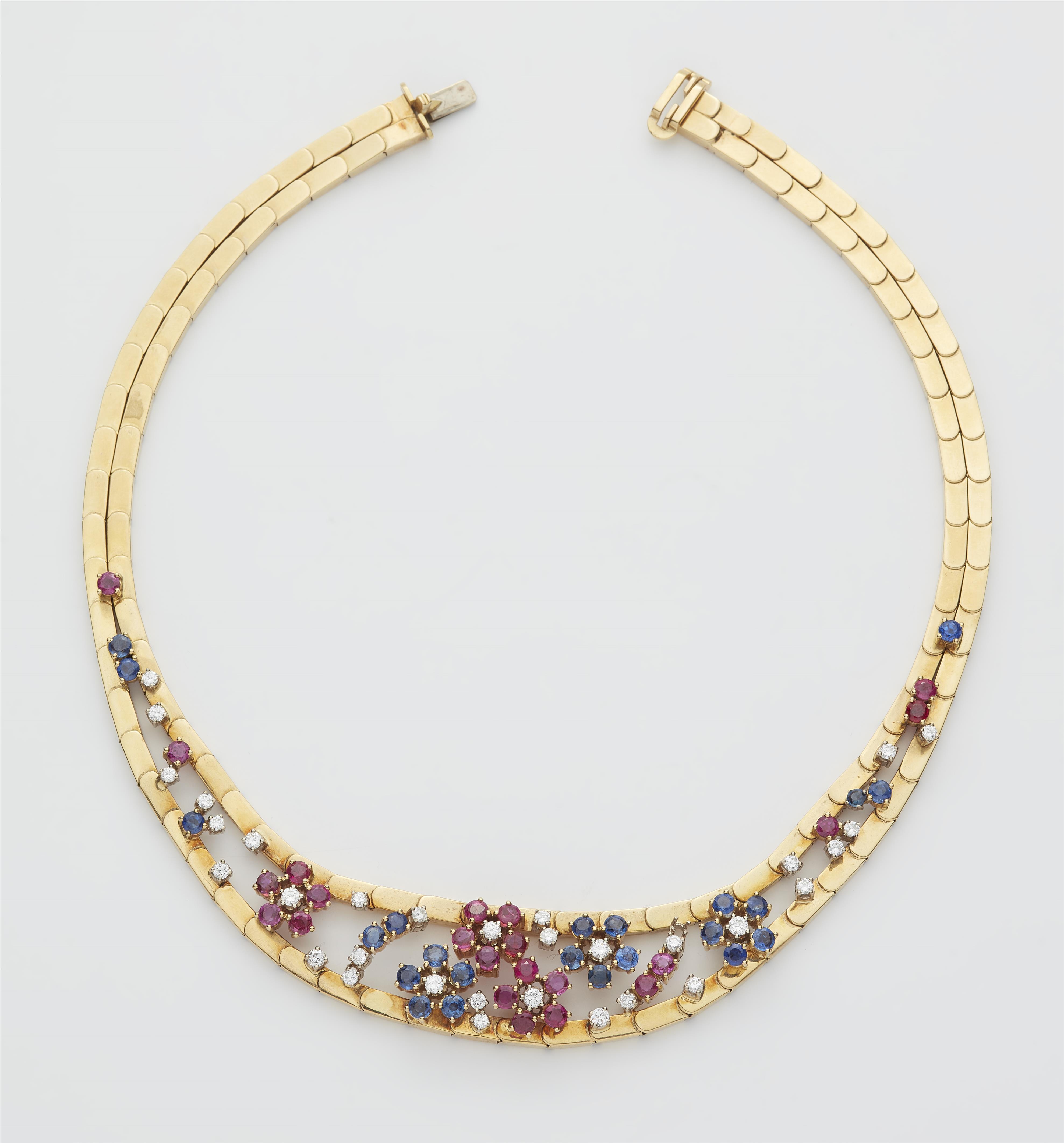 An 18k gold diamond sapphire and ruby necklace. - image-1
