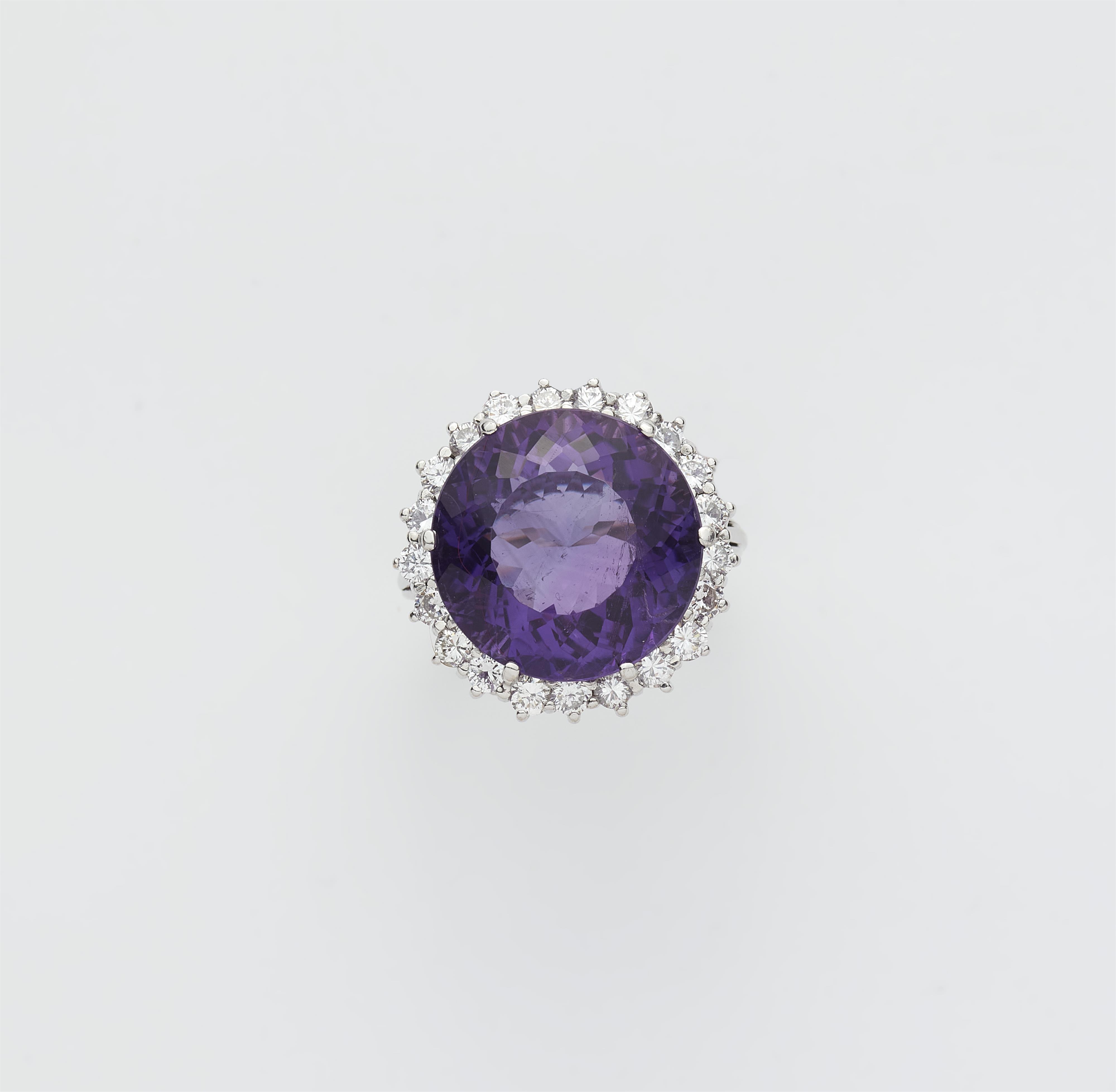 An 18k gold diamond and amethyst cluster ring. - image-1