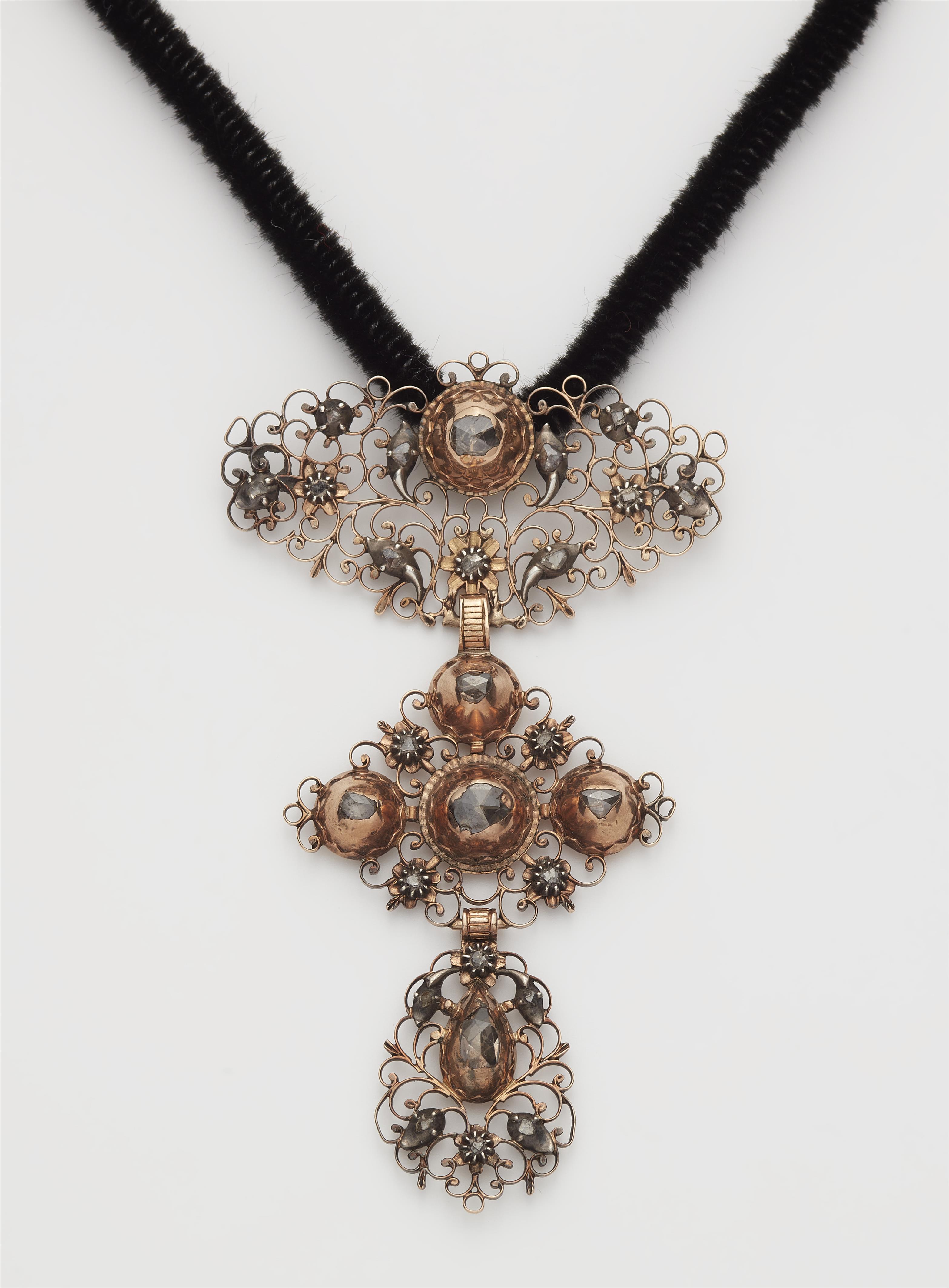 A Flemish 18k red gold silver and diamond cross pendant. - image-1