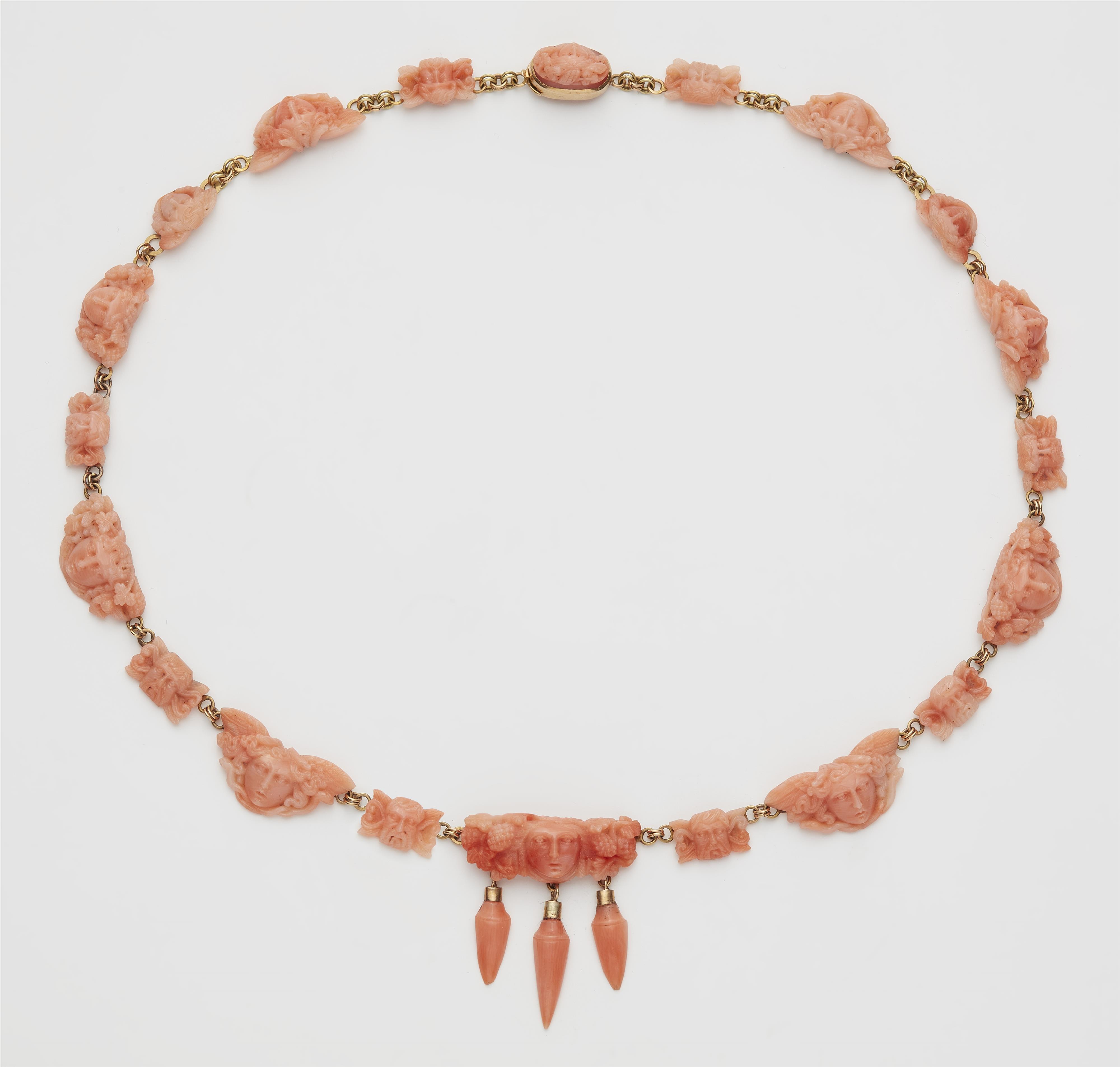 An Archaeological Revival style 18k gold and Sciacca coral cameo necklace. - image-1