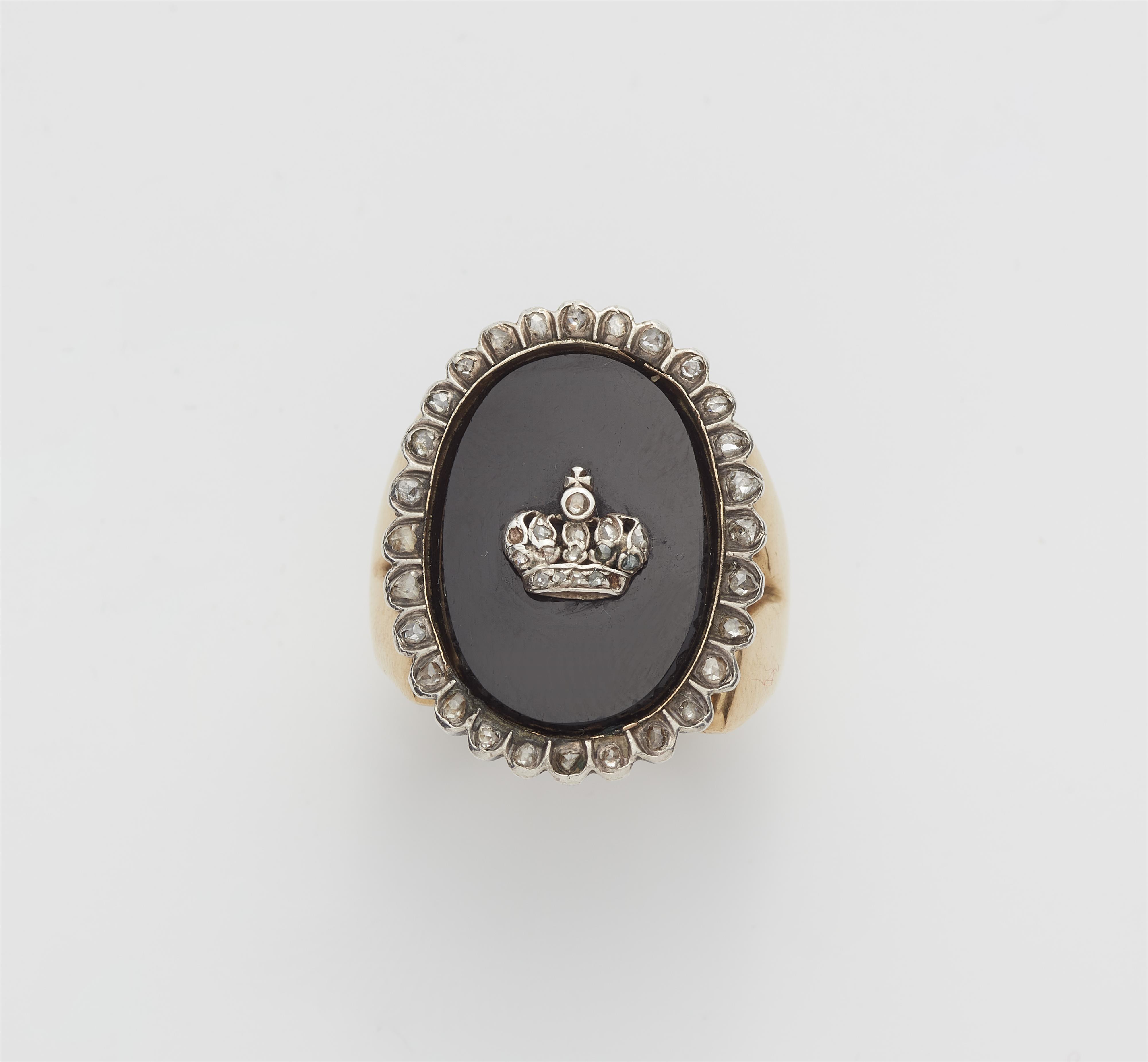 An 18k gold onyx and jewelled crown ring. - image-1
