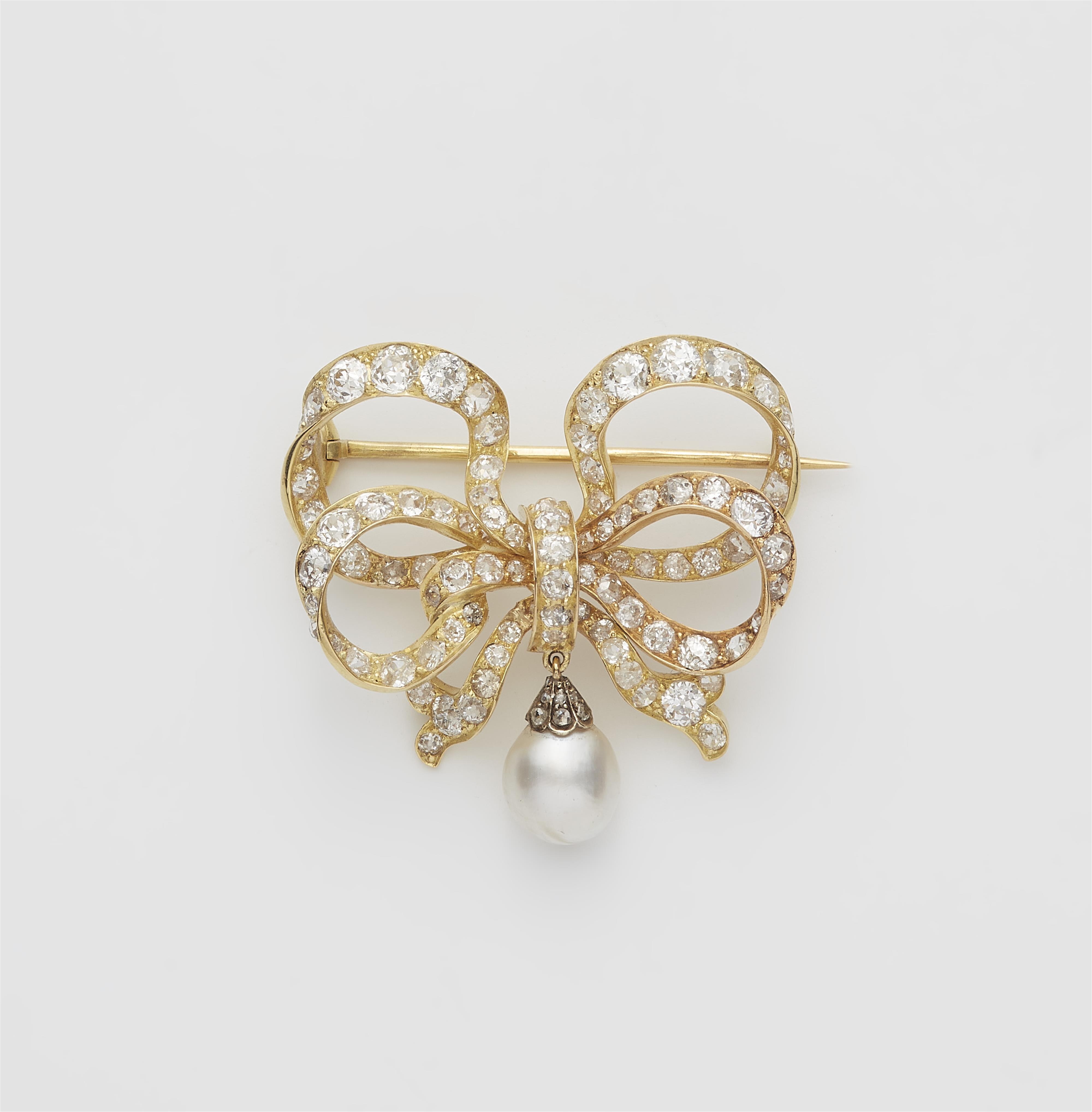 A 14k gold and European old-cut diamond bow brooch with pearl droplet. - image-1