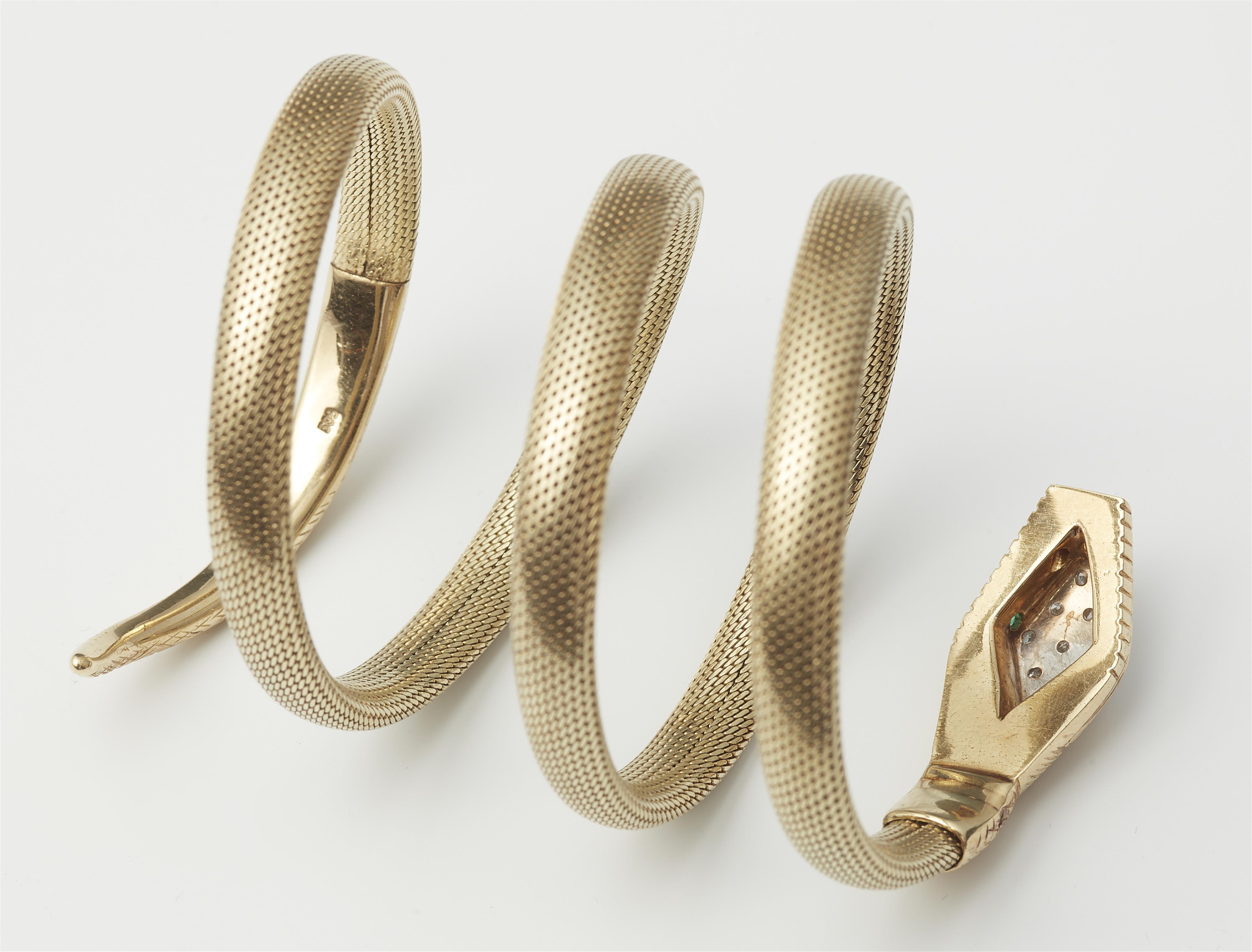 A flexible 14k gold tubogaz snake bracelet with jewelled head. - image-2