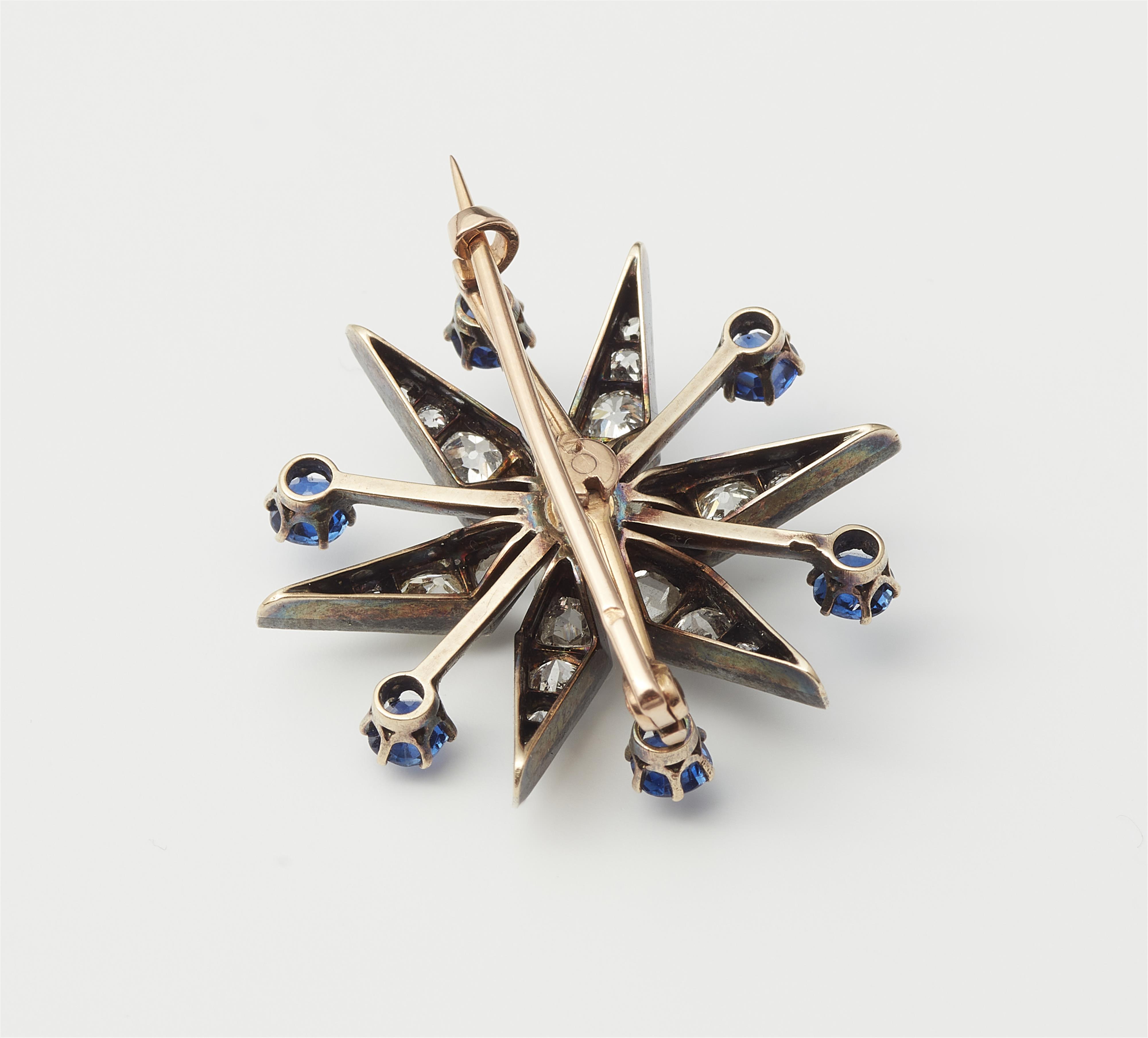 A French Belle Epoque silver 18k gold diamond and sapphire star brooch with detachable mount. - image-3