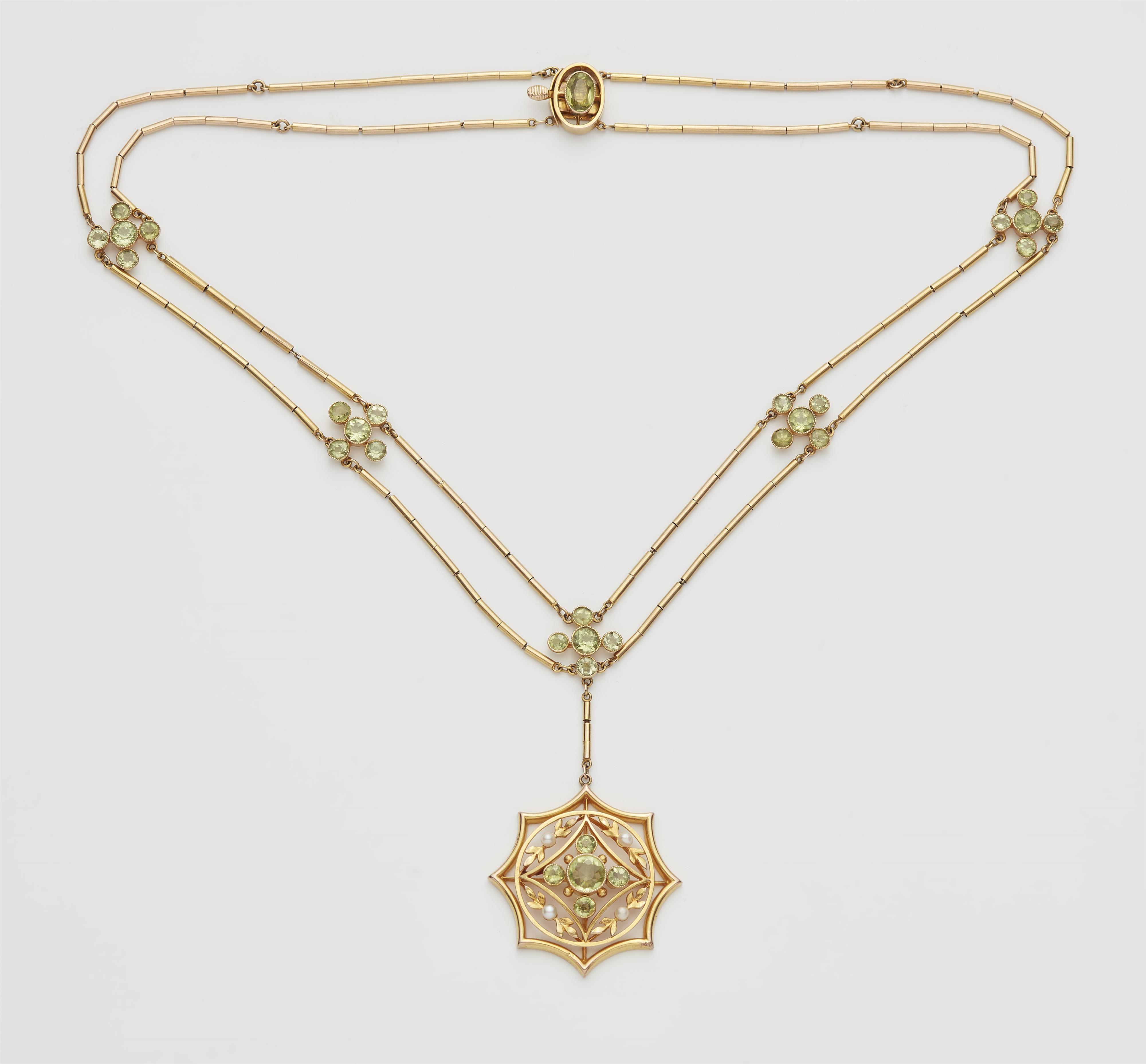 A probably English 9k gold and peridot pendant necklace. - image-1