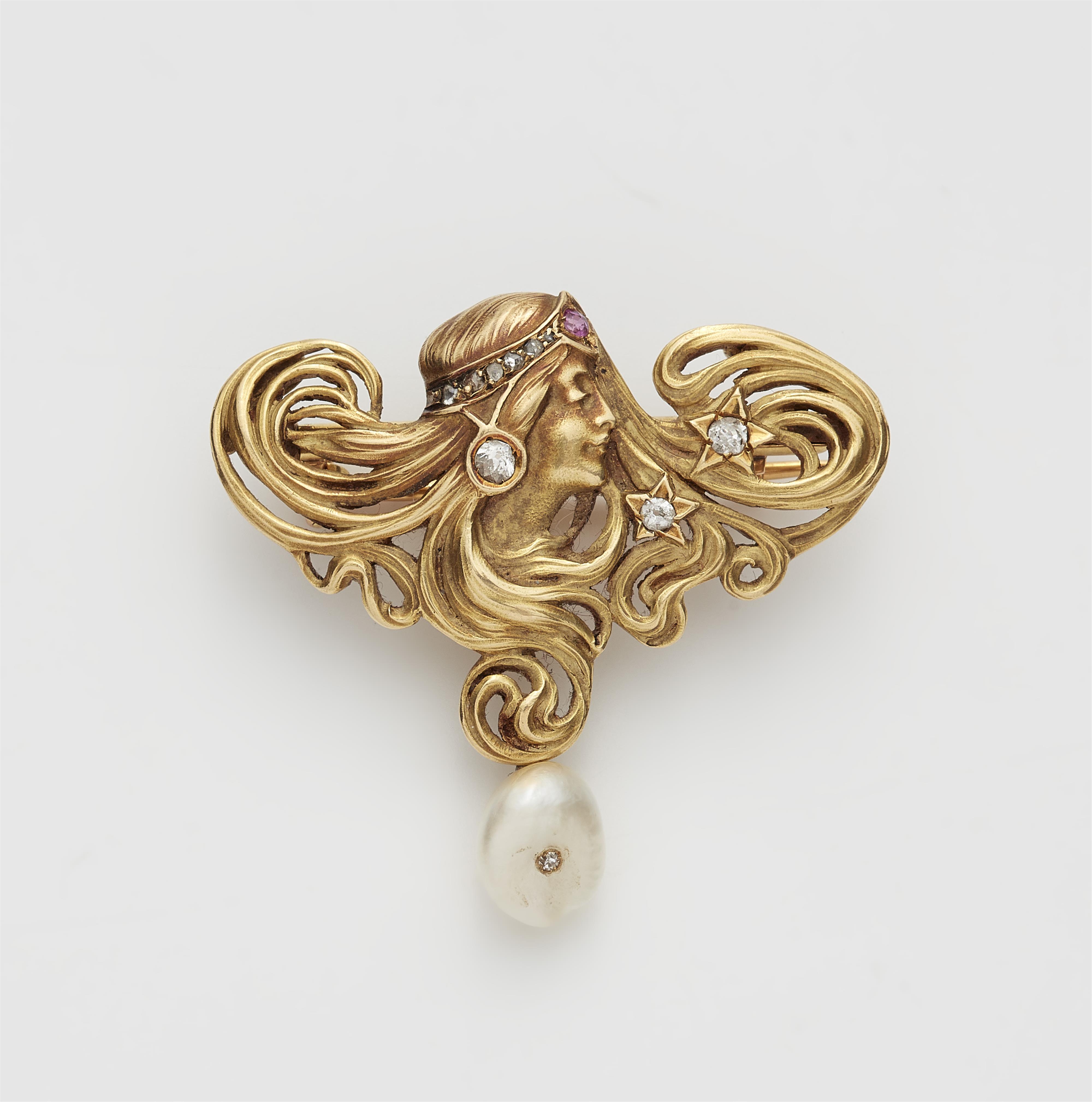 A French Art Nouveau 18k gold, diamond ruby and pearl pendant brooch. - image-1