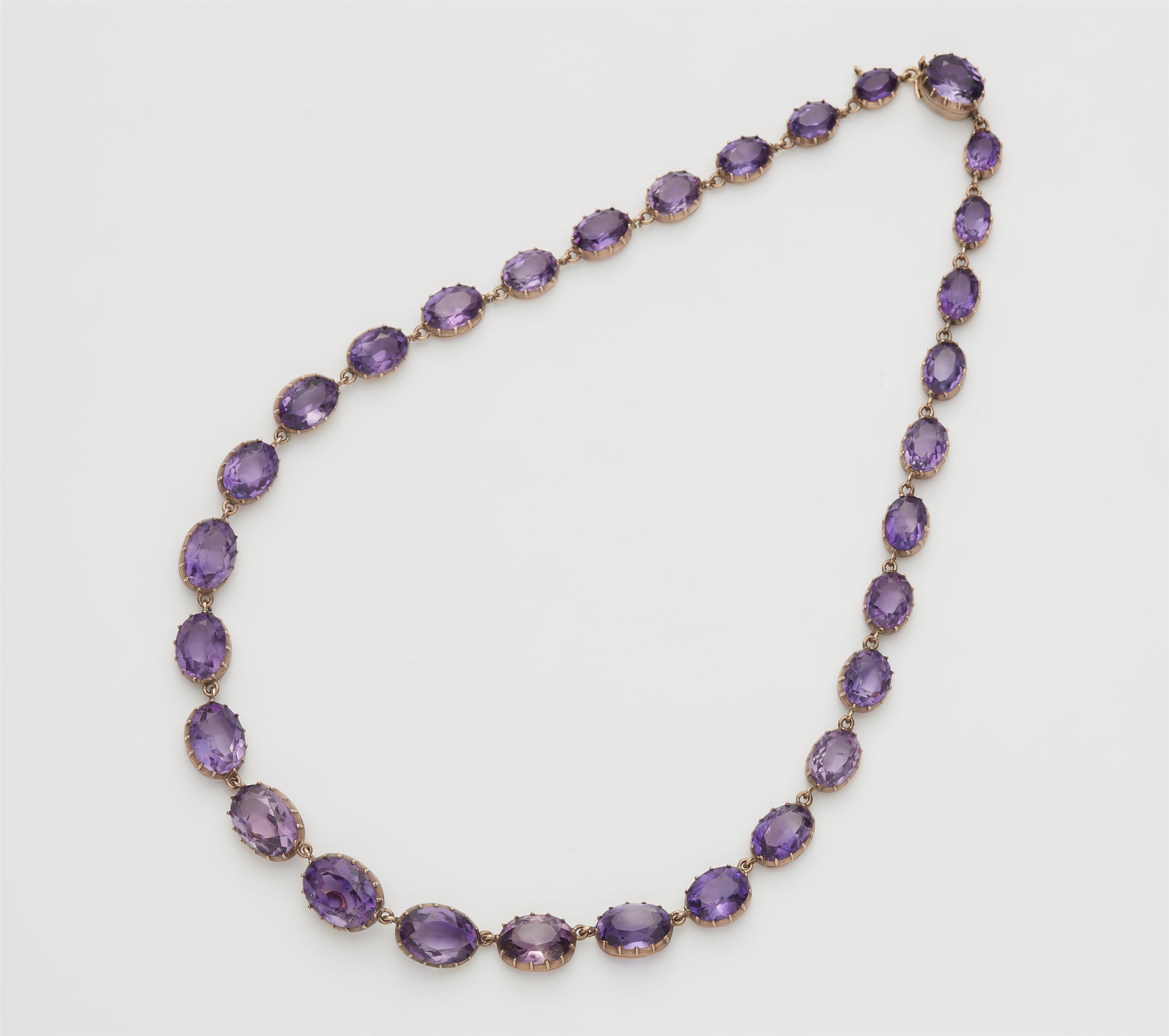 A Victorian 14k red gold and graduated amethyst necklace. - image-1